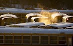 Steam rises up over a school bus lot on Thursday, Feb. 13, 2020, in Des Moines, Iowa. Temperatures Thursday morning dropped to minus 33 degrees with t