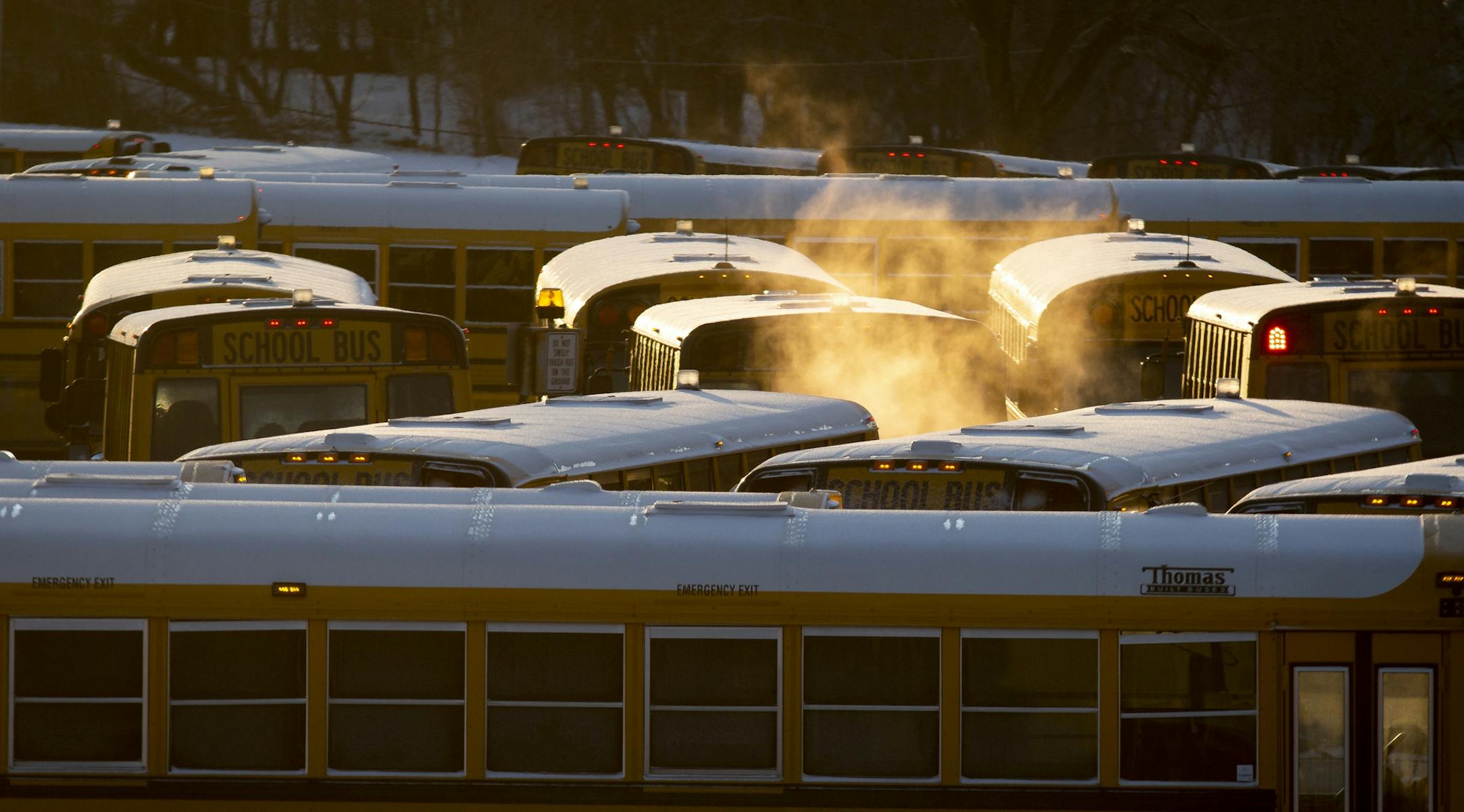 Steam rises up over a school bus lot on Thursday, Feb. 13, 2020, in Des Moines, Iowa. Temperatures Thursday morning dropped to minus 33 degrees with the windchill. (Brian Powers/The Des Moines Register via AP)
