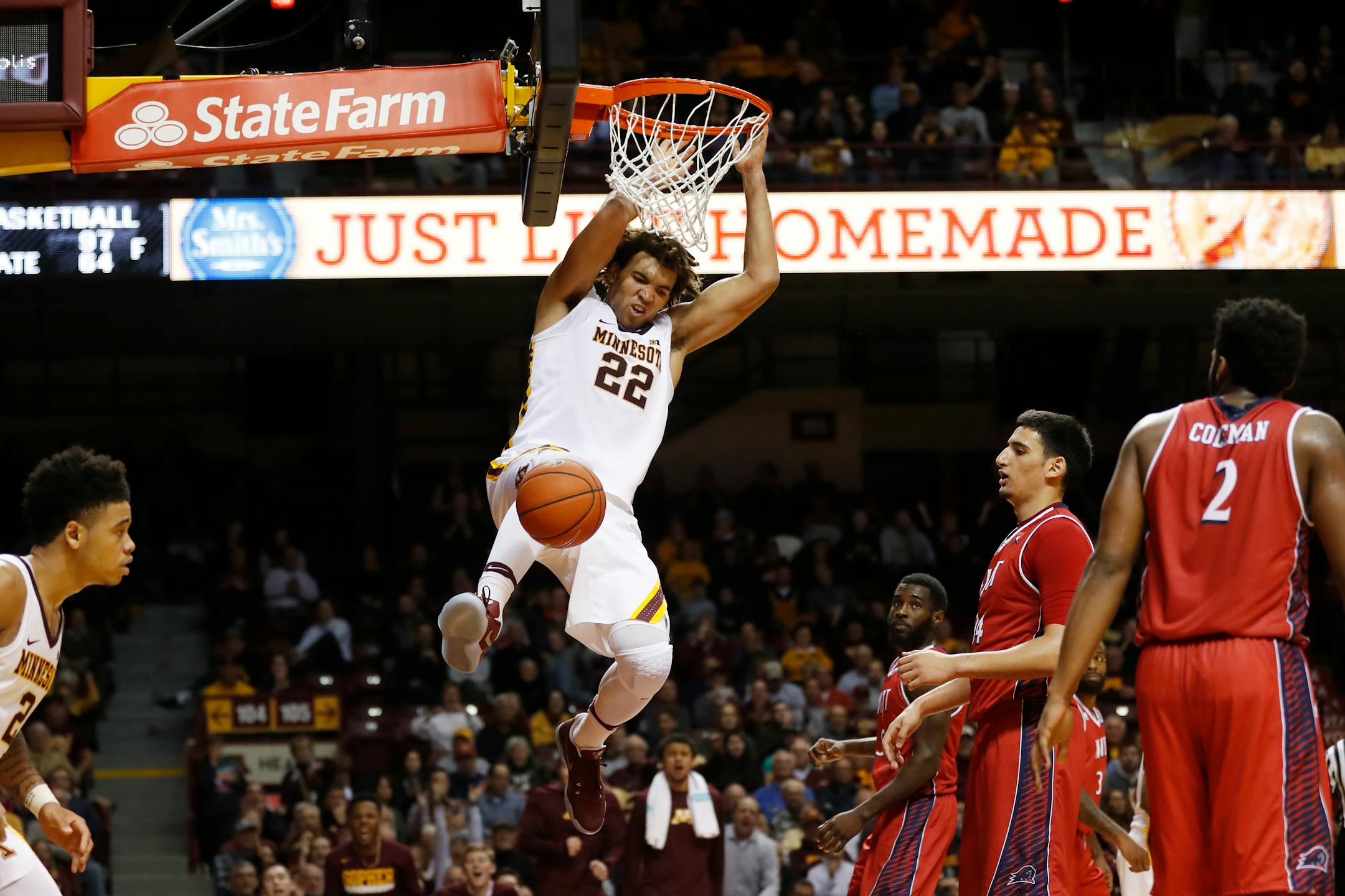 Gophers center Reggie Lynch (22) dunked for two in the second half at Williams Arena on Tuesday.