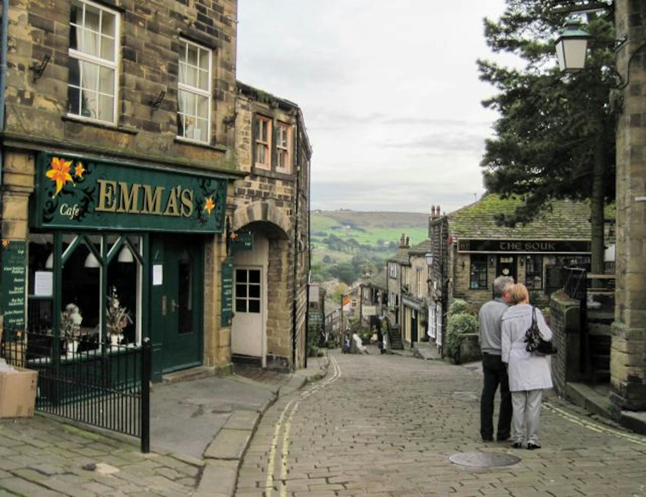 A couple tours the cobbled Main Street in the village of Haworth. Nearby is the Bronte Parsonage Museum -- home to the Brontes from 1820 to 1861.