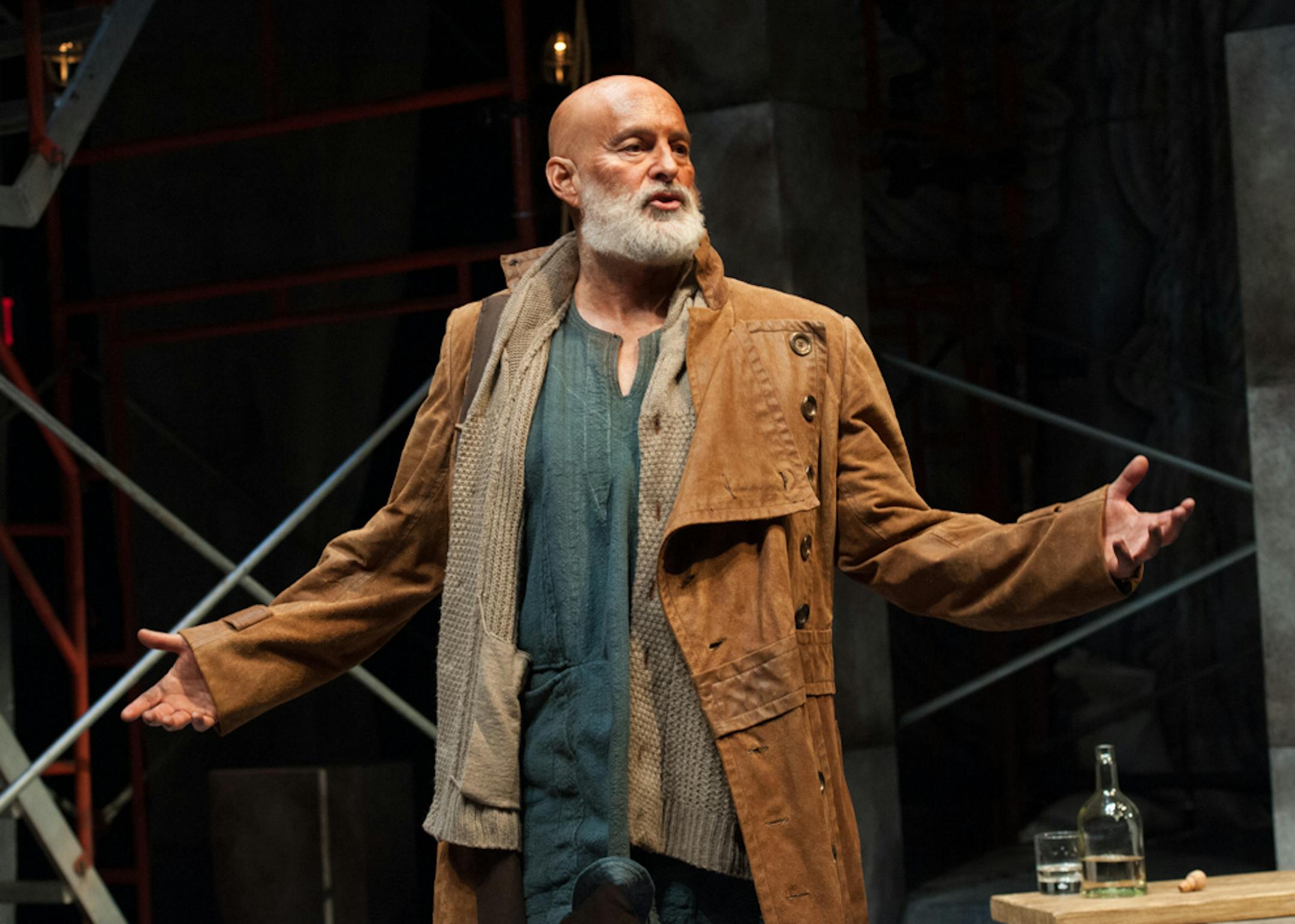 Stephen Yoakam (The Poet) in the Guthrie Theater's production of An Iliad, adapted from Homer by Lisa Peterson and Denis O'Hare, translation by Robert Fagles. Directed by Benjamin McGovern, set design by Michael Hoover, costume design by Christine A. Richardson and lighting design by Tom Mays. May 4-26, 2013 in the Dowling Studio at the Guthrie Theater, Minneapolis. Photo by Aaron Fenster. Iliad-17.jpg