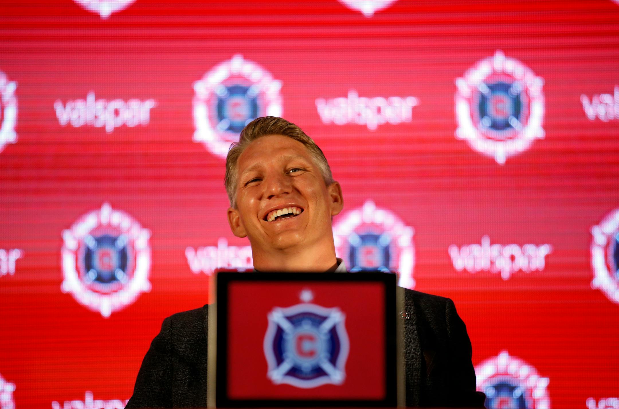The Chicago Fire's new player Basitan Schweinsteiger smiles as he listens to a question during a press conference at the The PrivateBank Fire Pitch in Chicago, Wednesday, March 29, 2017. (AP Photo/Nam Y. Huh)