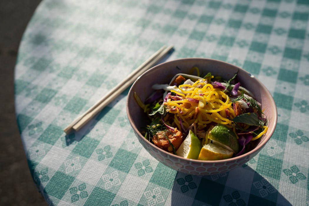 Khao Sen (Rice noodle with sweet chili dressing, cabbage, herbs, lime, and crusty salad) from chef Yia Vang is among the recipes included in “The Blue Zones American Kitchen.”