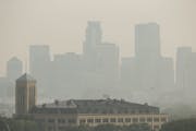 A haze settled in over the Minneapolis skyline one day in early July as smoke from Canadian wildfires drifted across Minnesota, leading to air quality