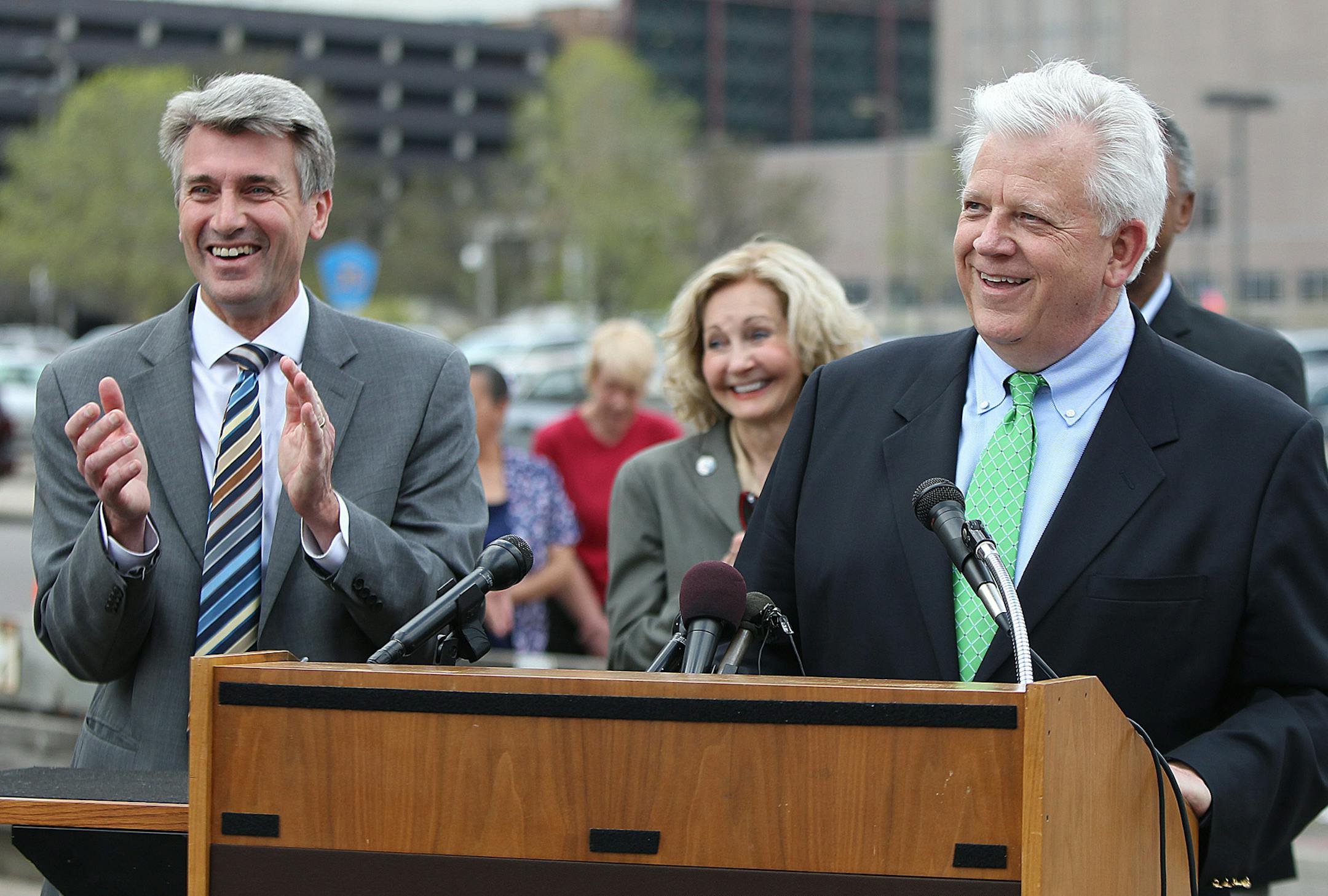 Rick Collins, the vice president of development at Ryan Companies US, Inc., and Minneapolis Mayor R.T. Rybak, left, were happy to go over renderings of the proposed re-devlopment of the land around the future Minnesota Vikings Stadium during a press conference, Tuesday, May 14, 2013.(ELIZABETH FLORES/STAR TRIBUNE) ELIZABETH FLORES • eflores@startribune.com