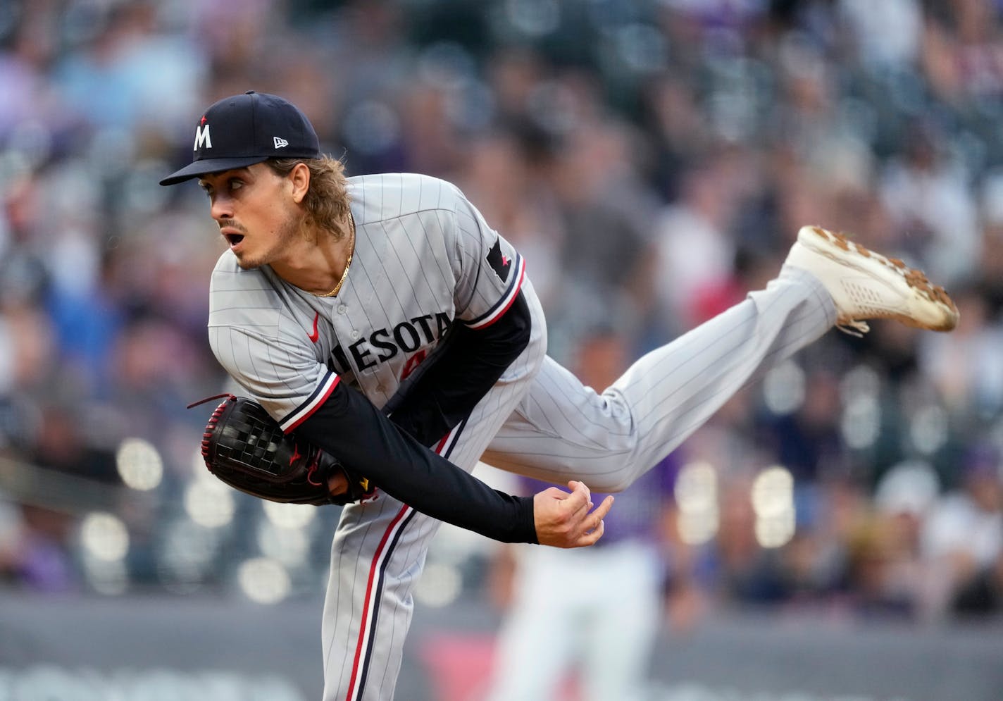 Twins pitcher Joe Ryan worked against the Rockies during the first inning Friday in Denver