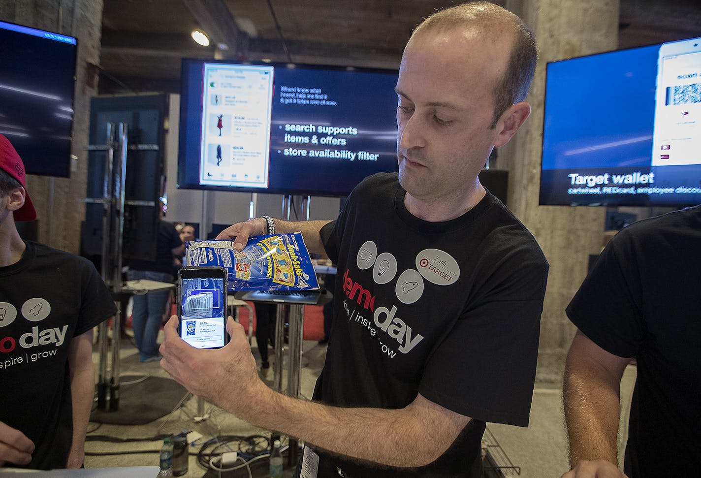 Zach Dillon showed visitors a Target App at Target's science fair type event introducing innovation-related projects, at Target Plaza Commons, Monday, September 11, 2017 in Minneapolis, MN. ] ELIZABETH FLORES &#xef; liz.flores@startribune.com