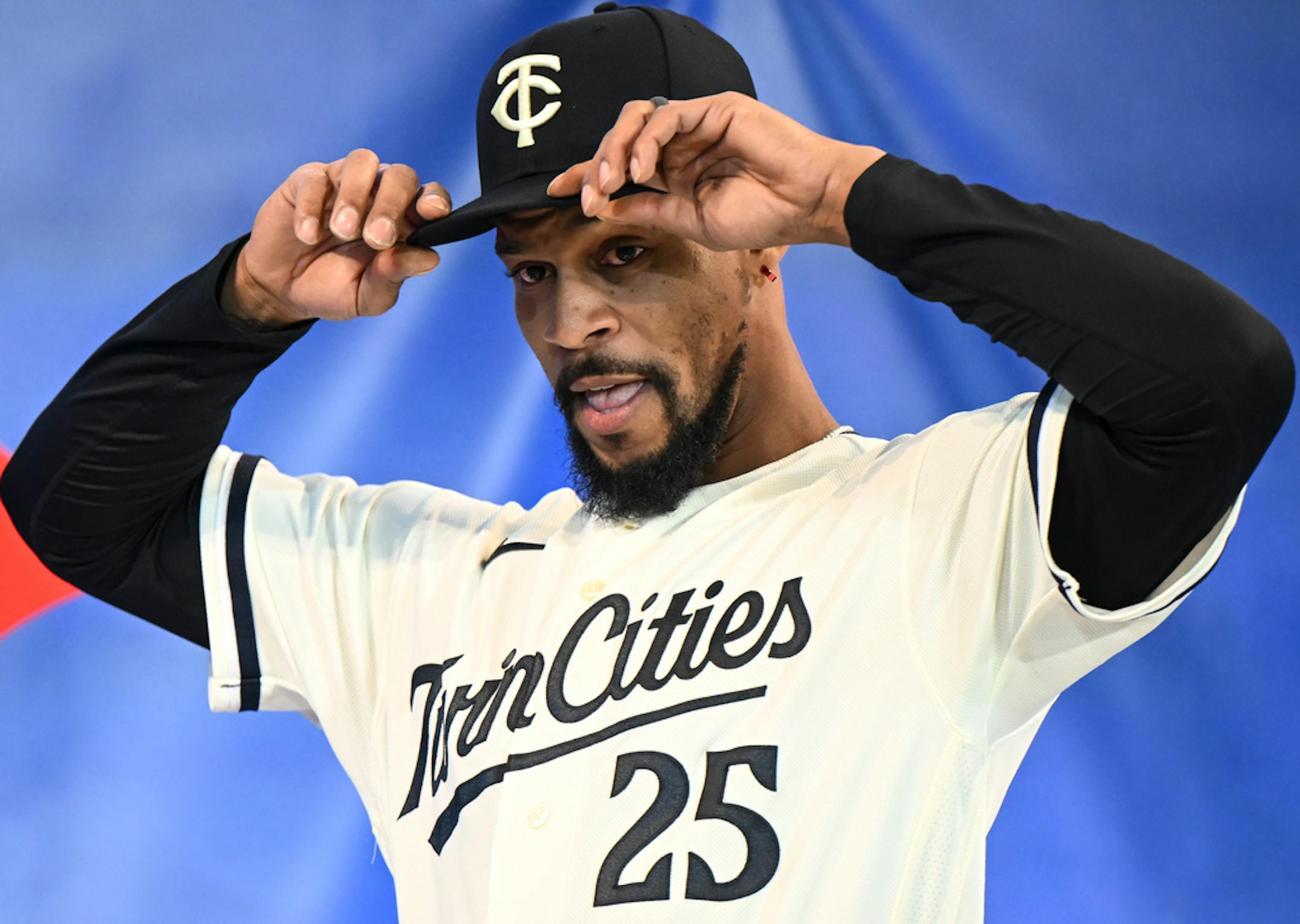Minnesota Twins center fielder Byron Buxton (25) models a new team jersey Friday.