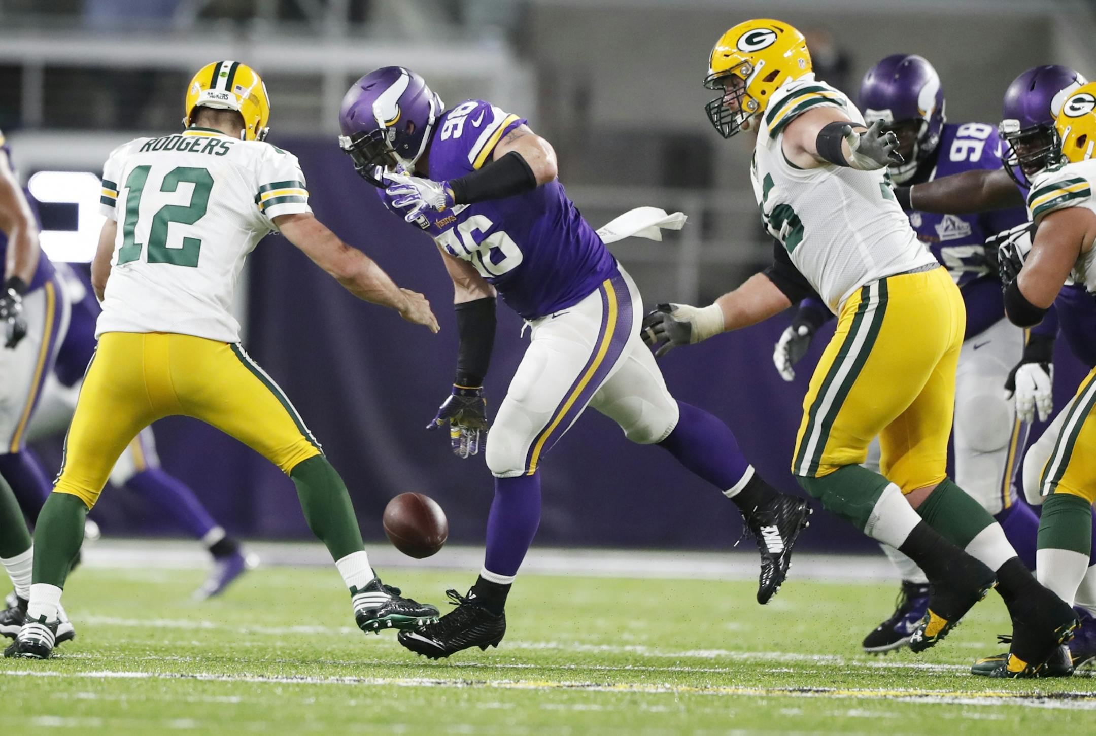 Minnesota Vikings defensive end Brian Robison (96) stripped Green Bay Packers quarterback Aaron Rodgers (12) in the forth quarter and the Vikings recovered the ball on the play at U.S. Bank Stadium Sunday September 18 ,2016 in Minneapolis, MN.
