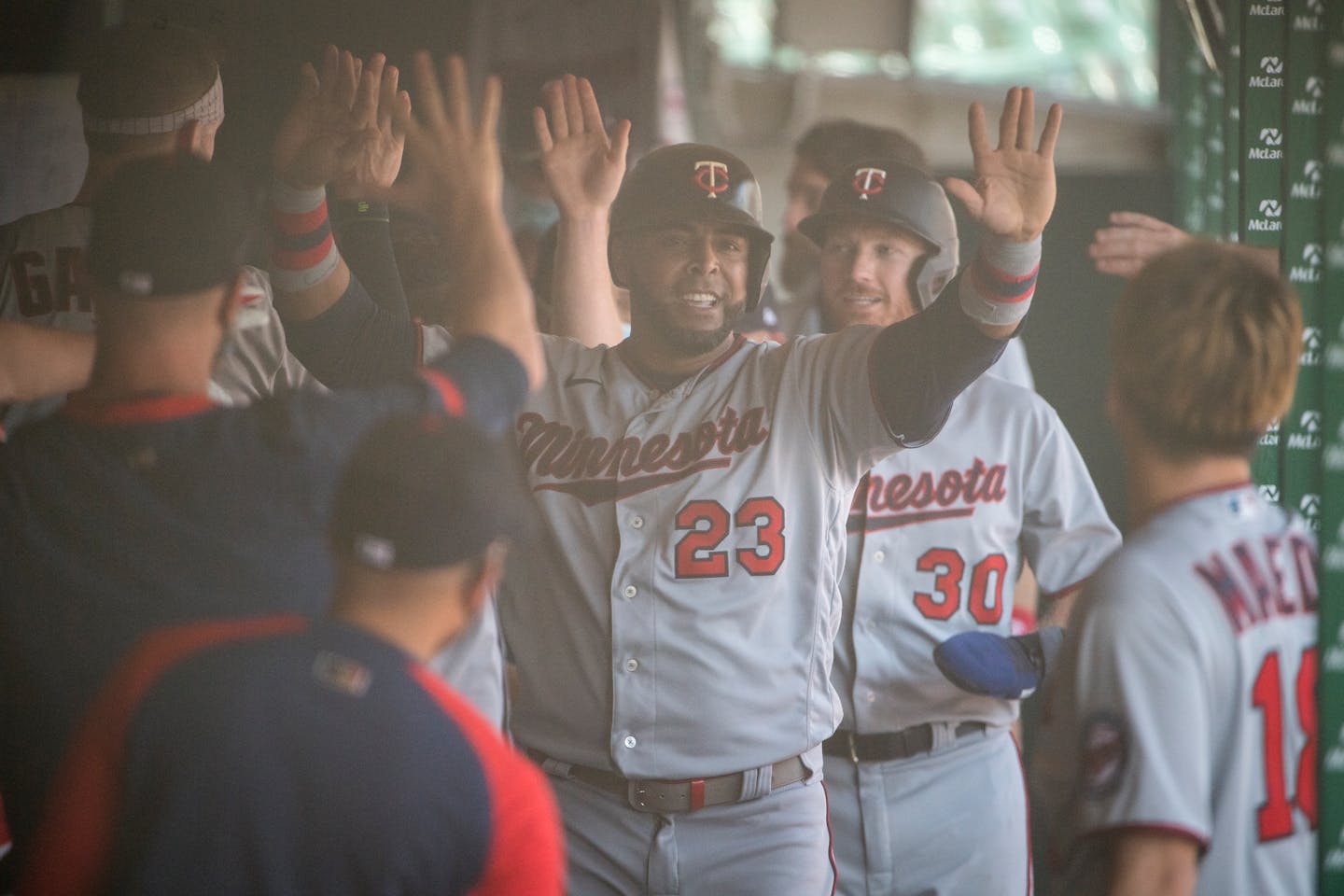 Nelson Cruz #23 of the Minnesota Twins celebrates after scoring a run during the top of the sixth inning against the Detroit Tigers at Comerica Park on April 07, 2021 in Detroit, Michigan. (Nic Antaya/Getty Images/TNS) ORG XMIT: 13141605W