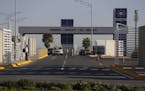 Cars exit the General Motors assembly plant in Villa de Reyes, outside San Luis Potosi, Mexico, Wednesday, Jan. 4, 2017, where the Aveo and Trax vehic