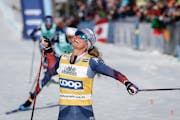 Jessie Diggins celebrated her victory in the women's 15km Mass Start freestyle World Cup race in Canmore, Alberta, on Friday.