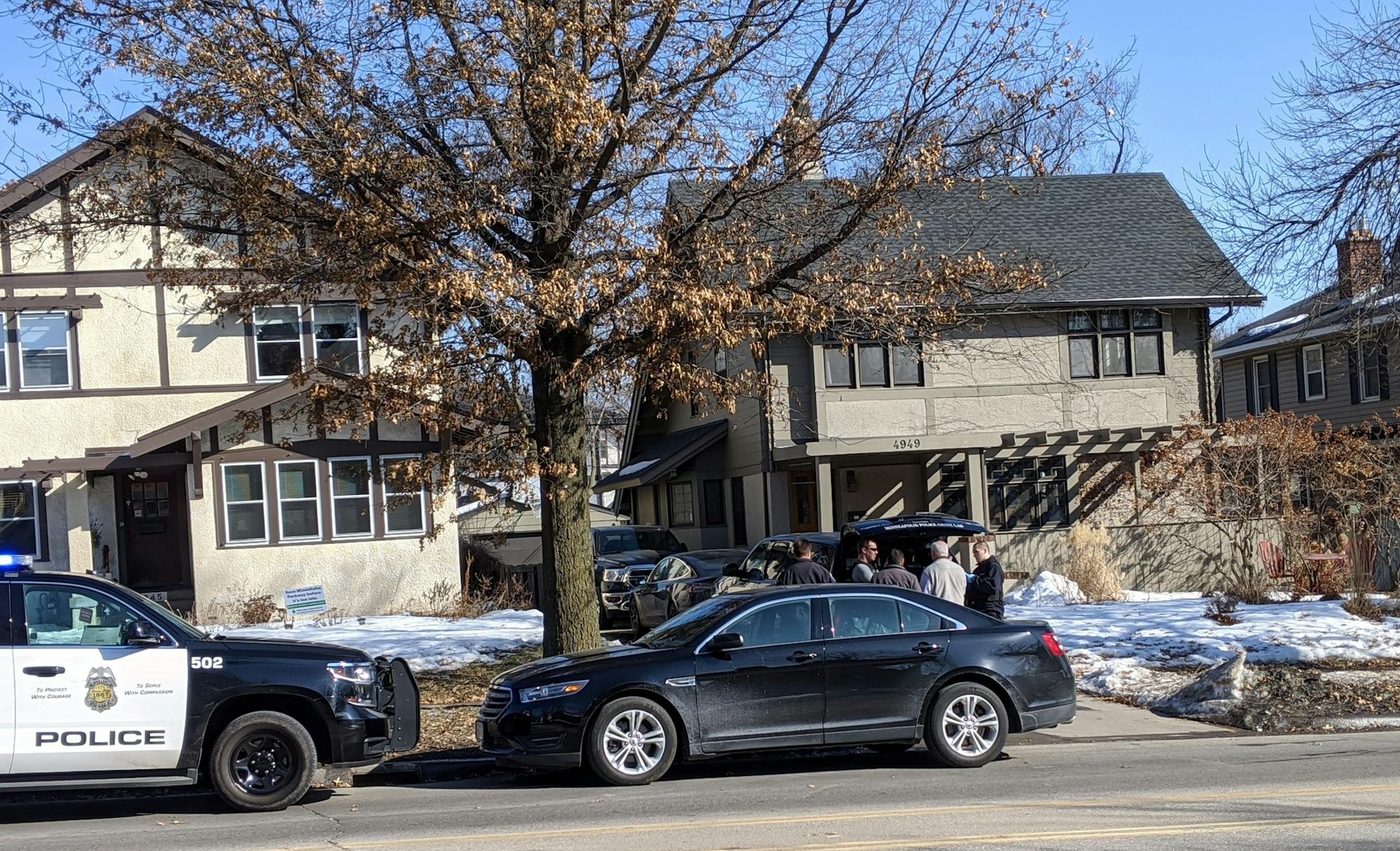 Photo by James Shiffer
Police worked at the scene of a double shooting Saturday afternoon in south Minneapolis. Two people were wounded in what police called a domestic crime.