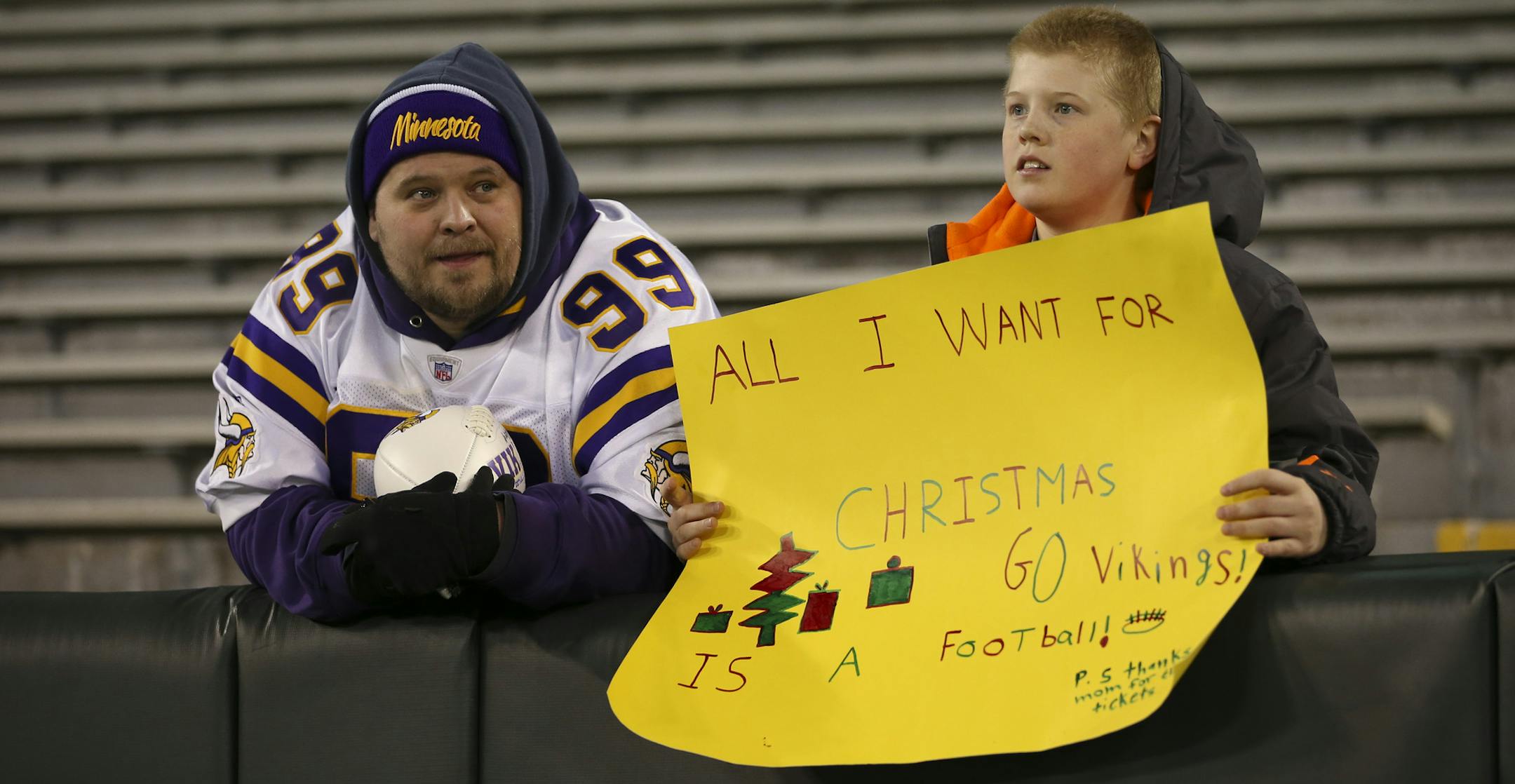 Charlie and Preston Hoflock of Marshall watched the Vikings warm up before facing the Packers Saturday night. ] JEFF WHEELER ï jeff.wheeler@startribune.com The Minnesota Vikings met the Green Bay Packers Saturday night, December 13, 2017 at Lambeau Field in Green Bay.