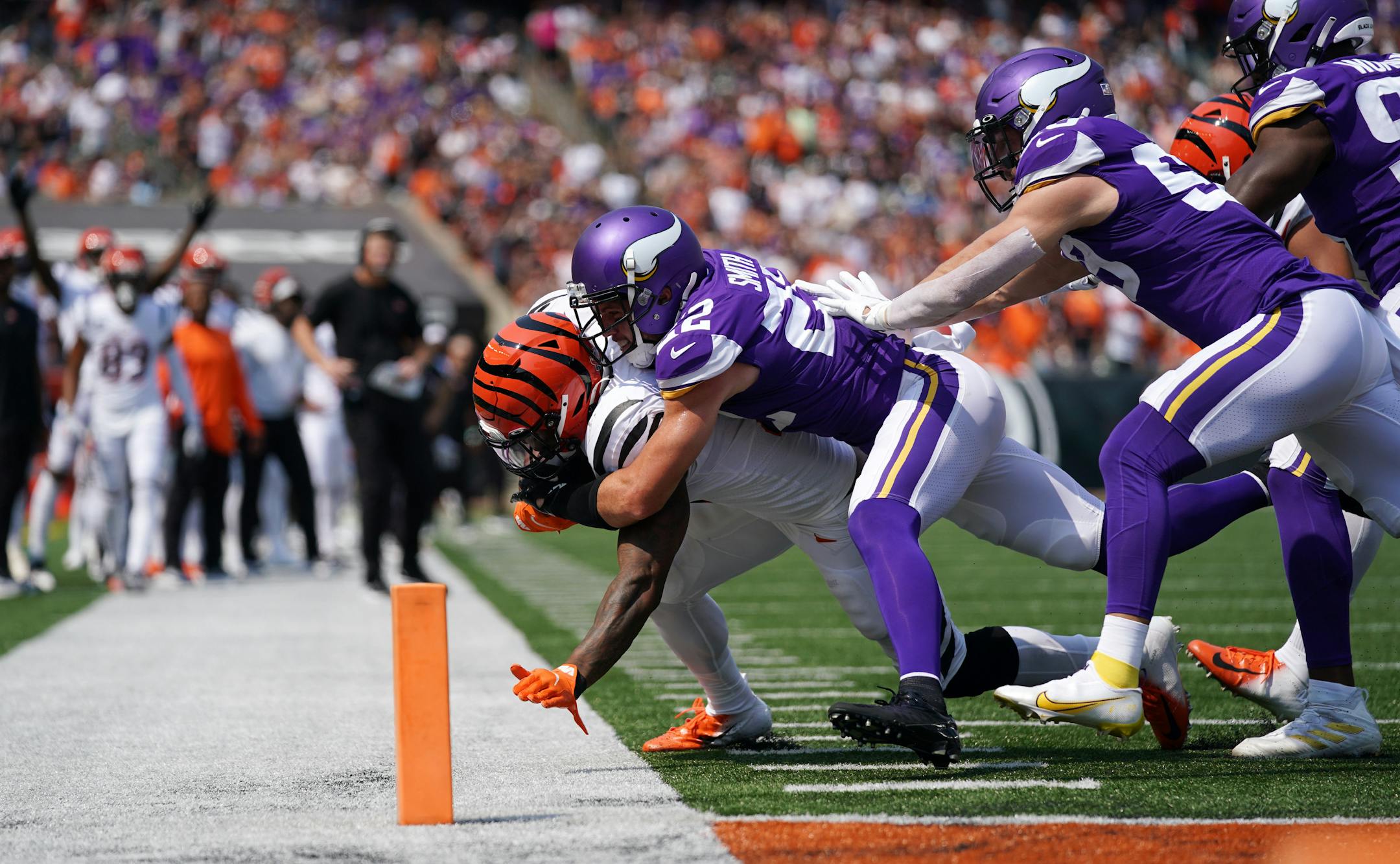 Minnesota Vikings free safety Harrison Smith (22) pushed Cincinnati Bengals running back Joe Mixon (28) out of bounds just shy of the goal line in the second quarter.