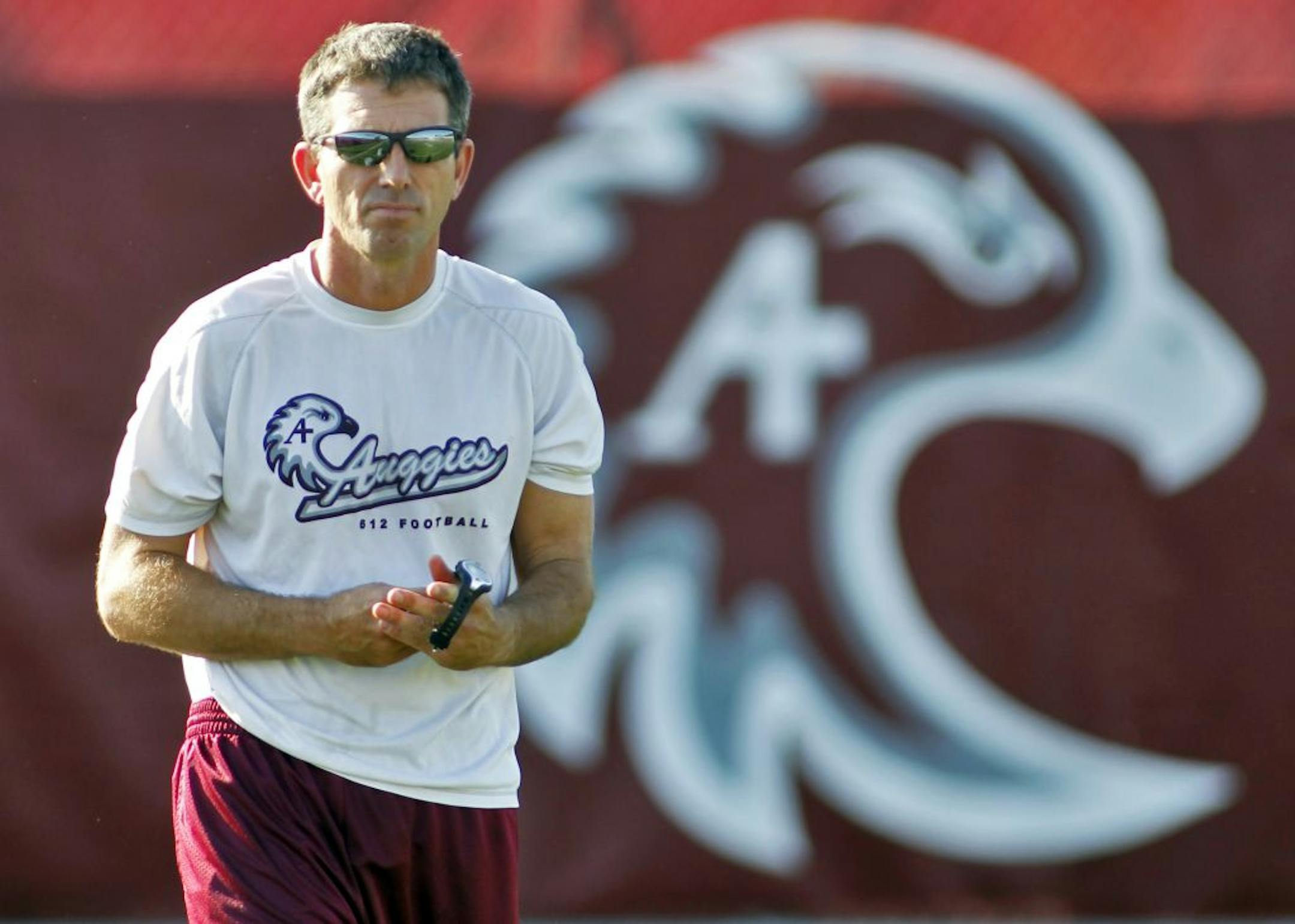 Profile of Augsburg College quarterback Marcus Brumm who has led the Auggies to a 4-0 record. Head Auggies football coach Frank Haege