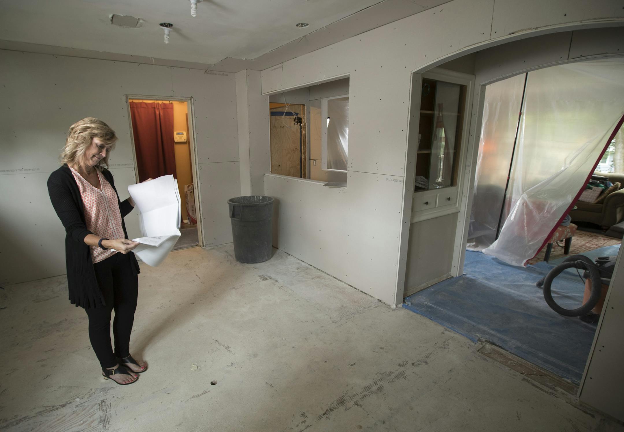 Meg Jaeger with New Spaces at the Edina home of Amy and Chris Wexler. "Many homeowners ... are opting to update," she said.