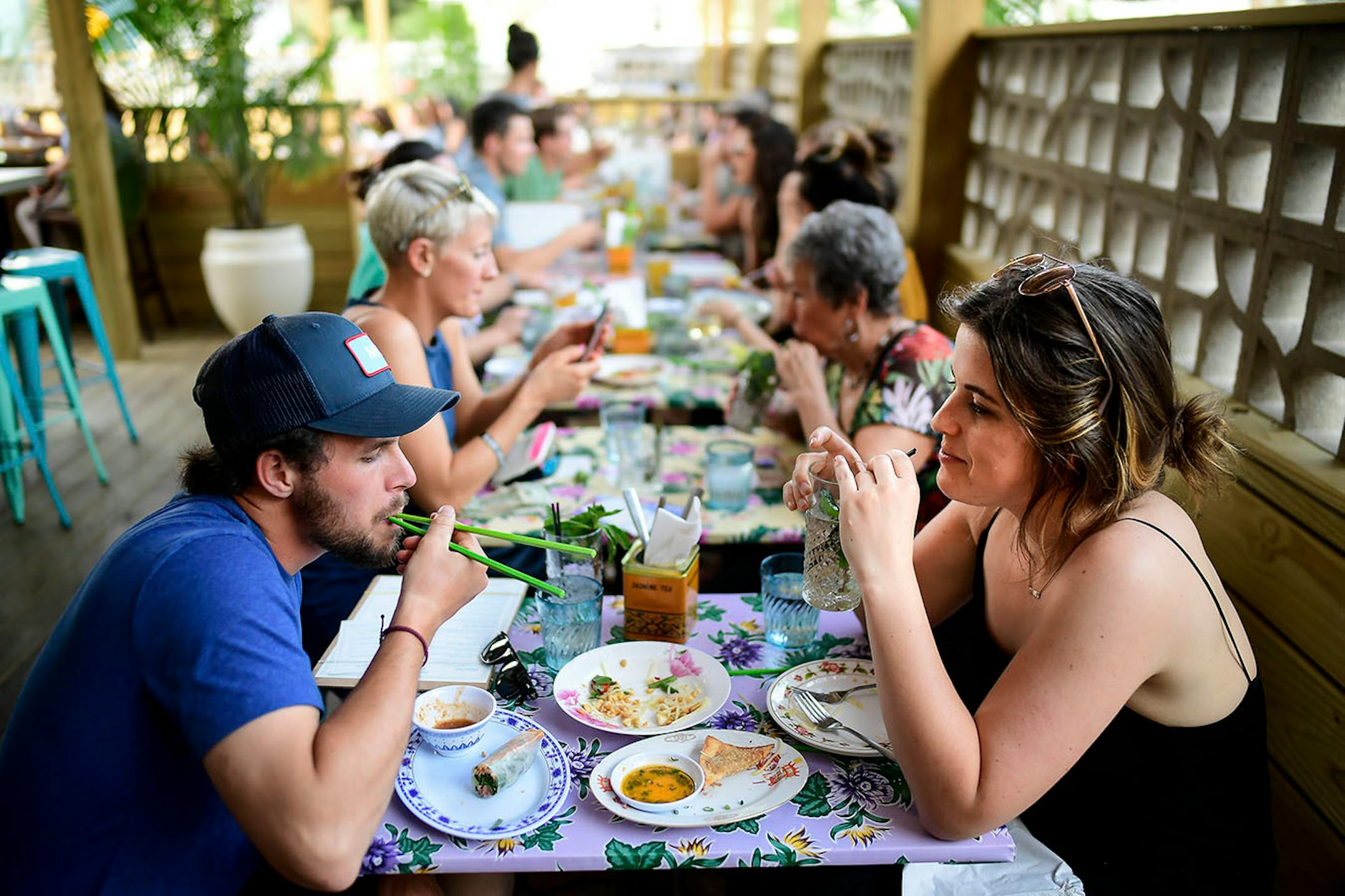 Nick Omodt and Kate Sandkamp shared food and drinks Thursday afternoon during happy hour at Hai Hai.