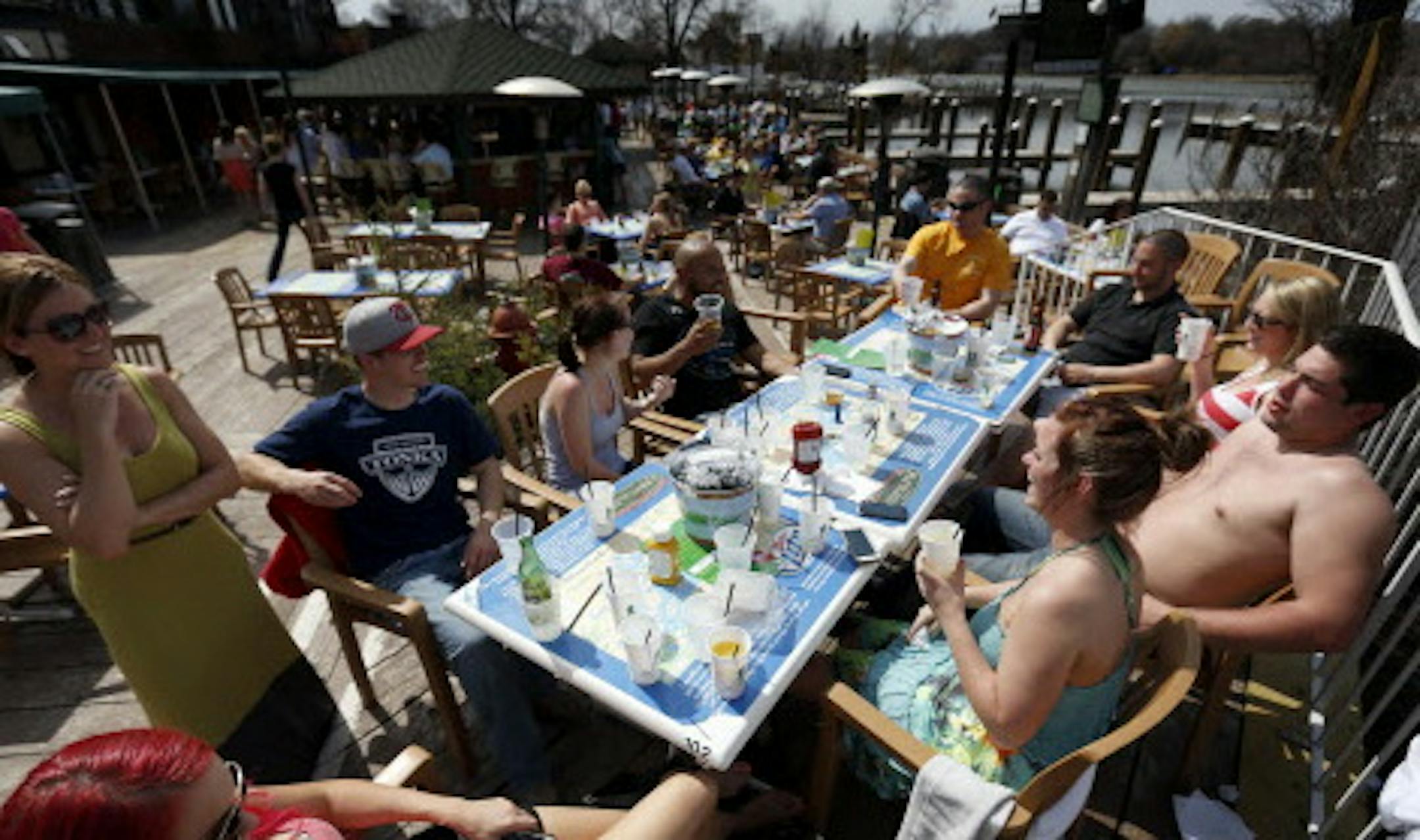 Patrons on the outdoor patio at Lord Fletcher's in Spring Park, Minn. ] CARLOS GONZALEZ cgonzalez@startribune.com April 28, 2013, Minneapolis, Spring Park, Minn., Outdoor Patios, Vita.mn, Lord Fletchers, Psycho Suzi's Motor Lounge, Union