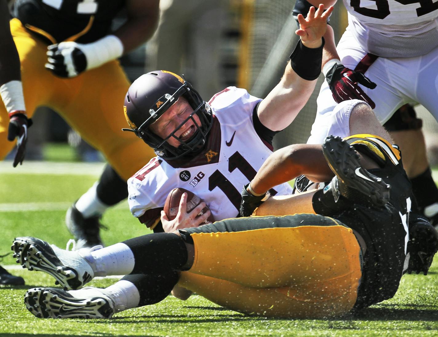 Minnesota Gophers vs. Iowa Hawkeyes football. Iowa won 31-13. Minnesota quarterback Max Shortell was sacked by the Iowa defense in the 2nd half. (MARLIN LEVISON/STARTRIBUNE(mlevison@startribune.com