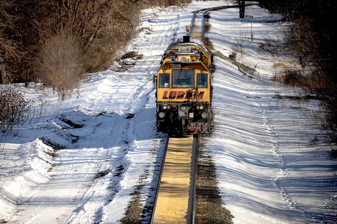 A train made its way along a path where corn spilled from a train on a Canadian Pacific line and sat two inches deep for just under a half-mile, Tuesday, January 7, 2020 in Crystal, MN.