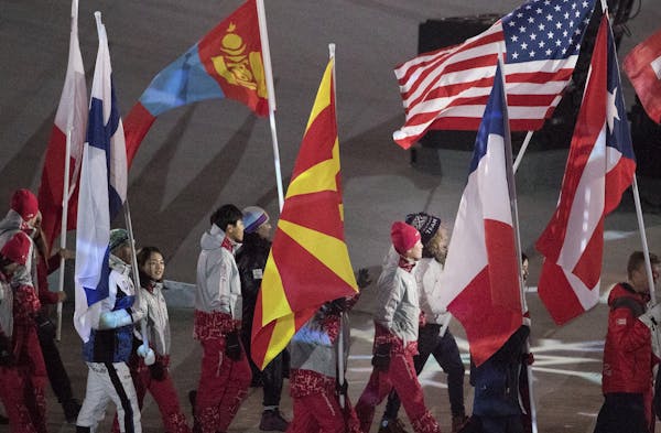 Jessie Diggins carried the flag for team USA at Closing Ceremony on Sunday night.