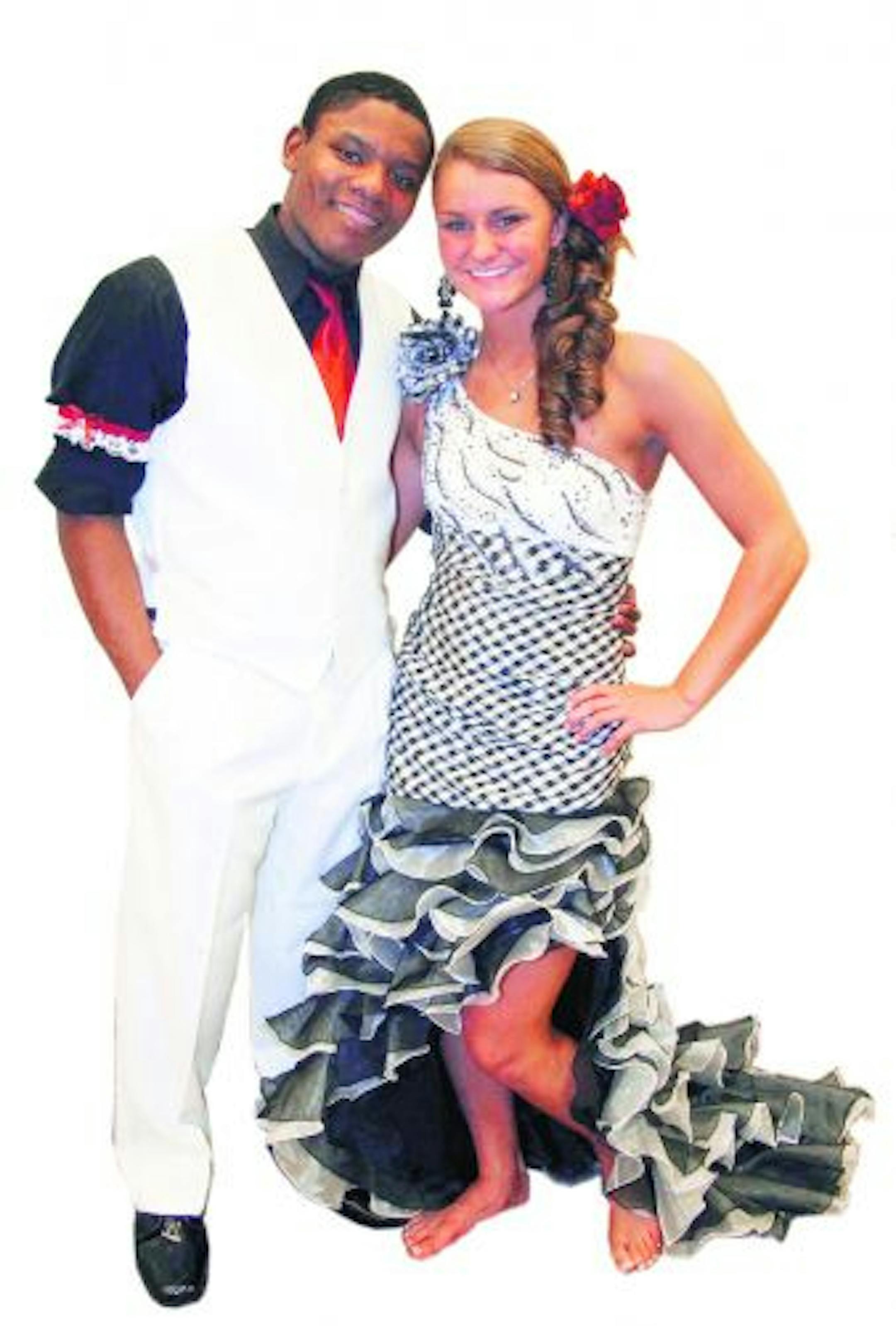 Junior Amos Duckworth plans to wear a $119 rental tuxedo from Men's Wearhouse; junior Callie Kowalenko plans to wear a $294 dress from Angelique's Bridal Salon in Blaine. High-low hems
Callie Kowalenko, junior
Dress: $294 from Angelique\u2019s Bridal Salon in Blaine
Why: \u201CI thought it was ugly when I saw it, but when I put it on it was so unique.\u201D