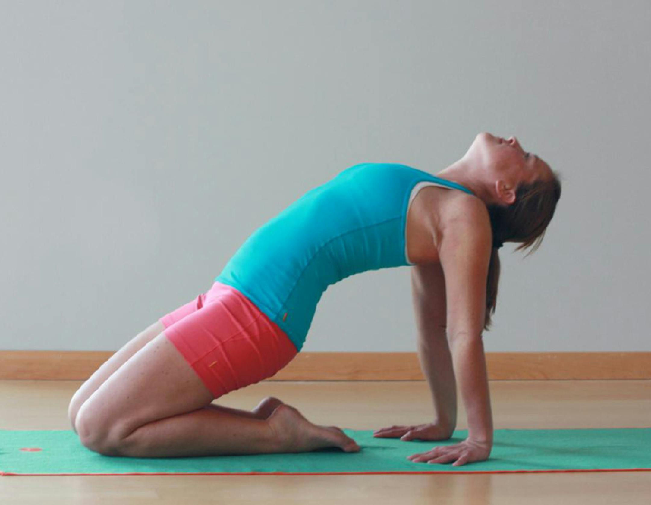The camel pose stretches quadriceps, shoulders, forearms and wrists; decompresses the middle and upper back; opens up the rib cage; and counteracts the forward hunching position of cycling. (Uma Kleppinger/BikeYoga.com/TNS)