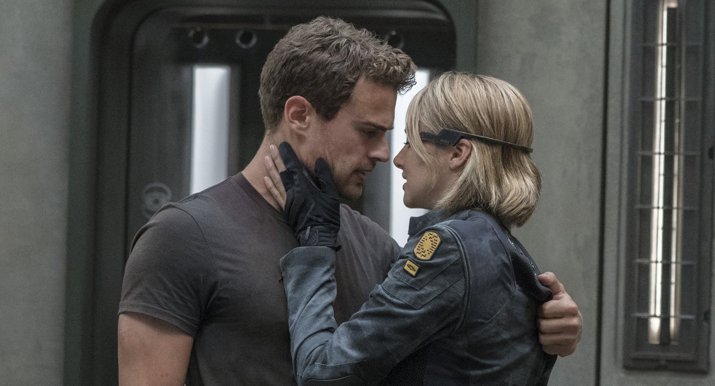 This image released by Lionsgate shows Shailene Woodley, right, and Theo James in a scene from "The Divergent Series: Allegiant." (Murray Close/Lionsgate via AP)