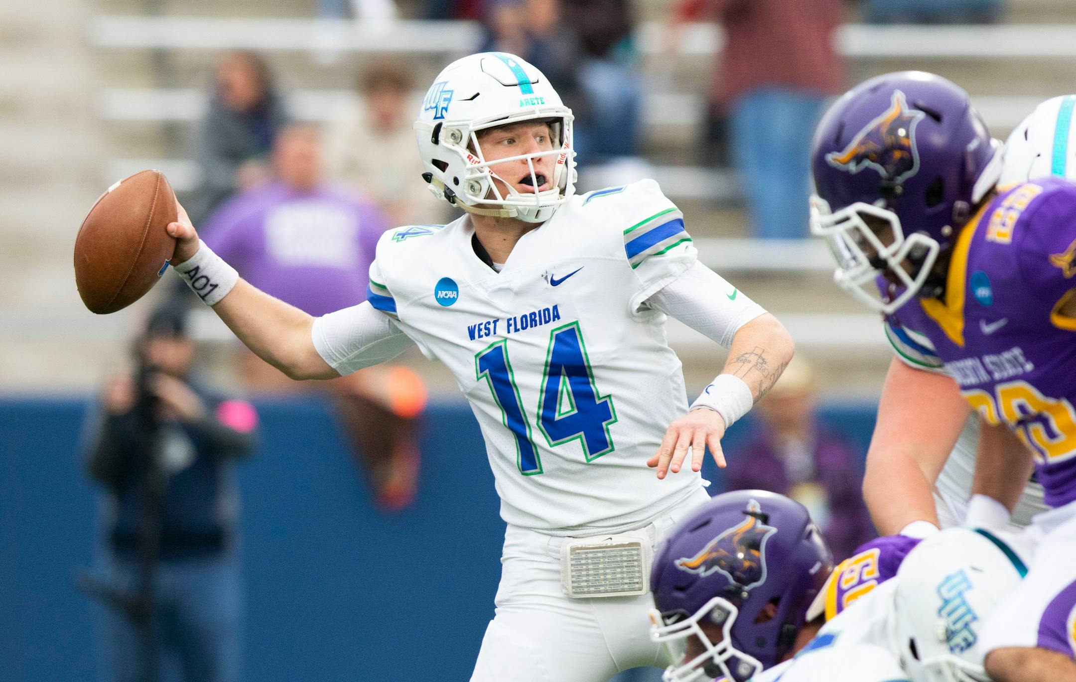 West Florida quarterback Austin Reed throws downfield during the Division II championship football game against Minnesota State