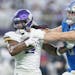 Vikings running back Alexander Mattison (2) is stopped by Lions defensive end John Cominsky (79) in the fourth quarter at U.S. Bank Stadium, in Minnea