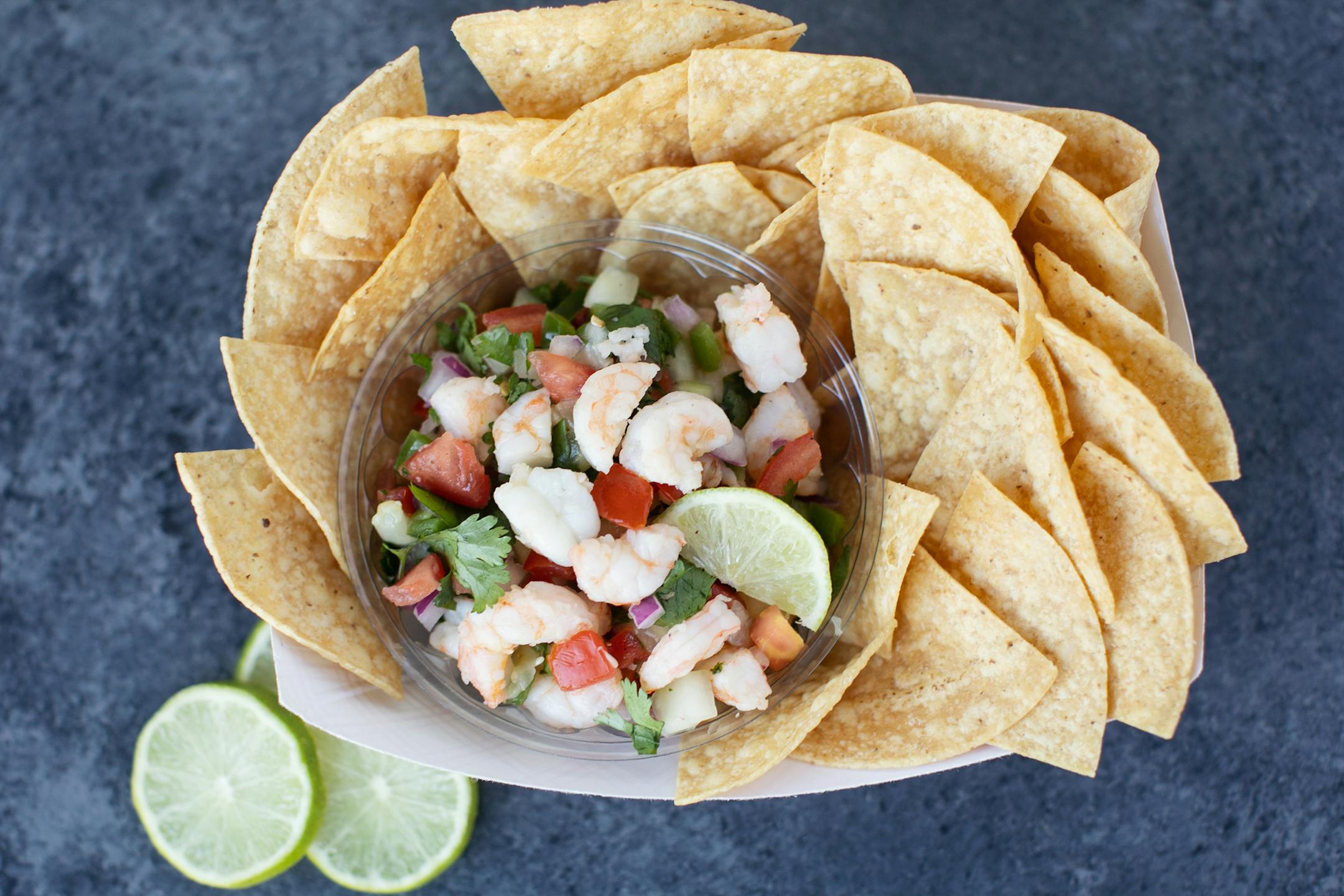 Shrimp Ceviche: Fresh shrimp, cucumbers, jalapeños, onions, tomatoes and cilantro tossed with a citrus lime juice and served cold with tortilla chips. At Shrimp Shack, located on the southwest corner of Carnes Av. & Underwood St.