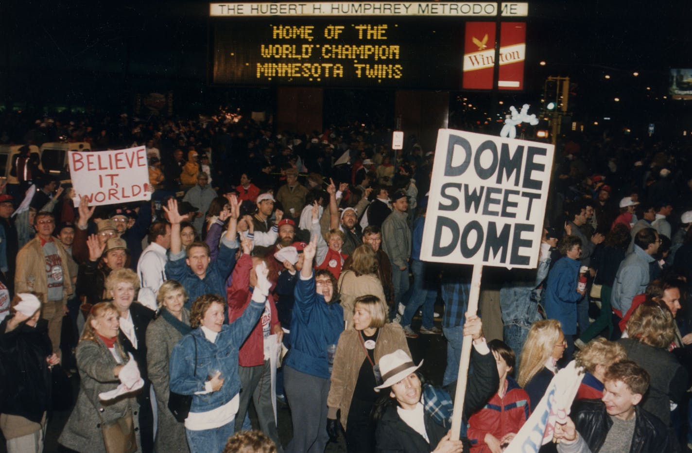 Minnesota Twins fans rejoice outside the Metrodome after winning Game 7 of the 1987 World Series.