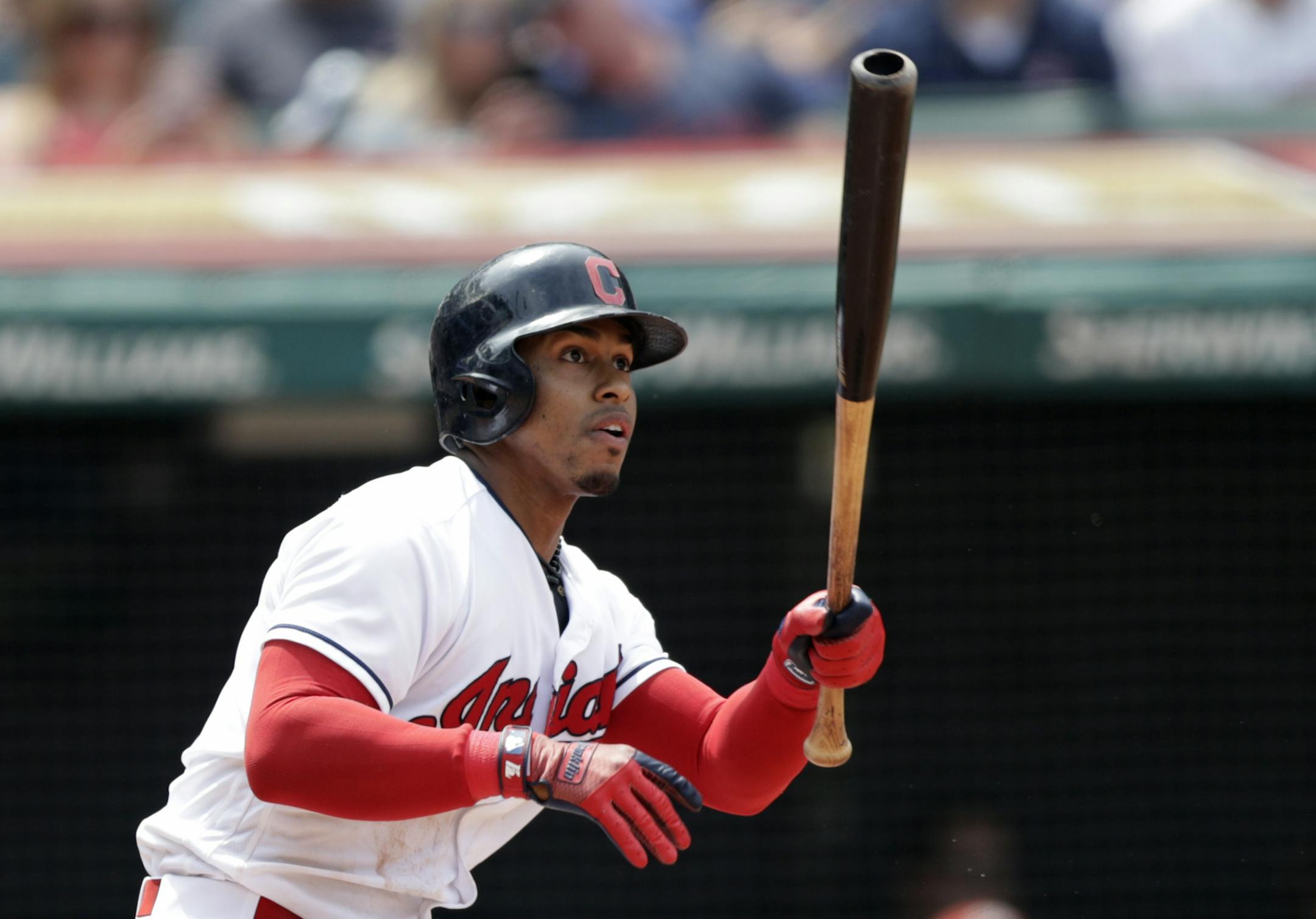 Cleveland Indians' Francisco Lindor watches his ball after hitting a one-run double off Minnesota Twins starting pitcher Jose Berrios in the fourth inning of a baseball game, Thursday, Aug. 9, 2018, in Cleveland. Jason Kipnis scored on the play. (AP Photo/Tony Dejak)