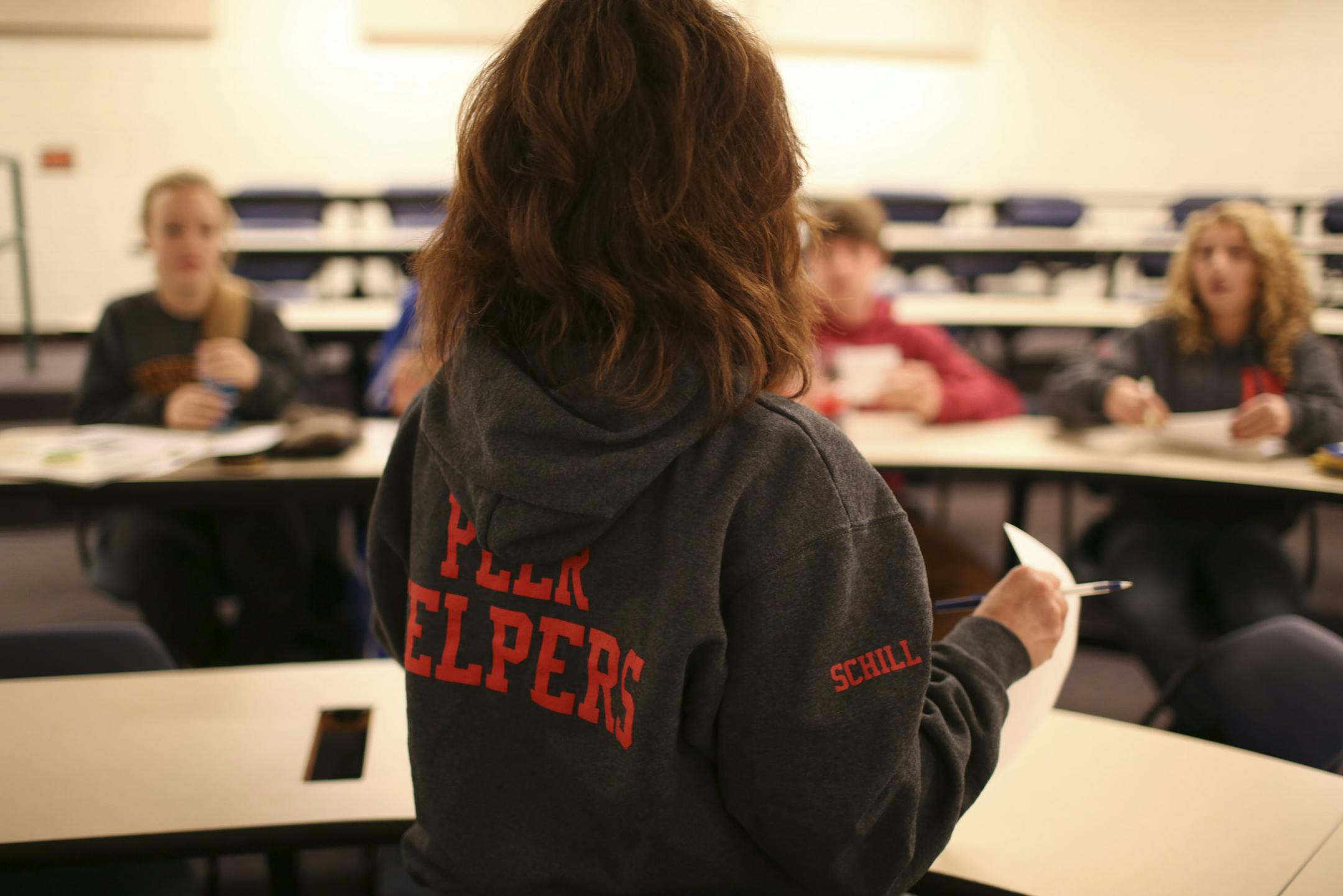 Peer Helpers is a program at Hastings High School aimed at teaching students how to counsel and help their fellow students with family, mental health, academic and chemical abuse issues.The idea is that students prefer talking with fellow students about their problems, whenever possible. At the Peer Helpers monthly meeting Tuesday night, December 3, 2013 at Hastings High School, school psychologist Melissa Schill wore a Peer Helpers branded hoodie. ] JEFF WHEELER &#x201a;&#xc4;&#xa2; jeff.wheele