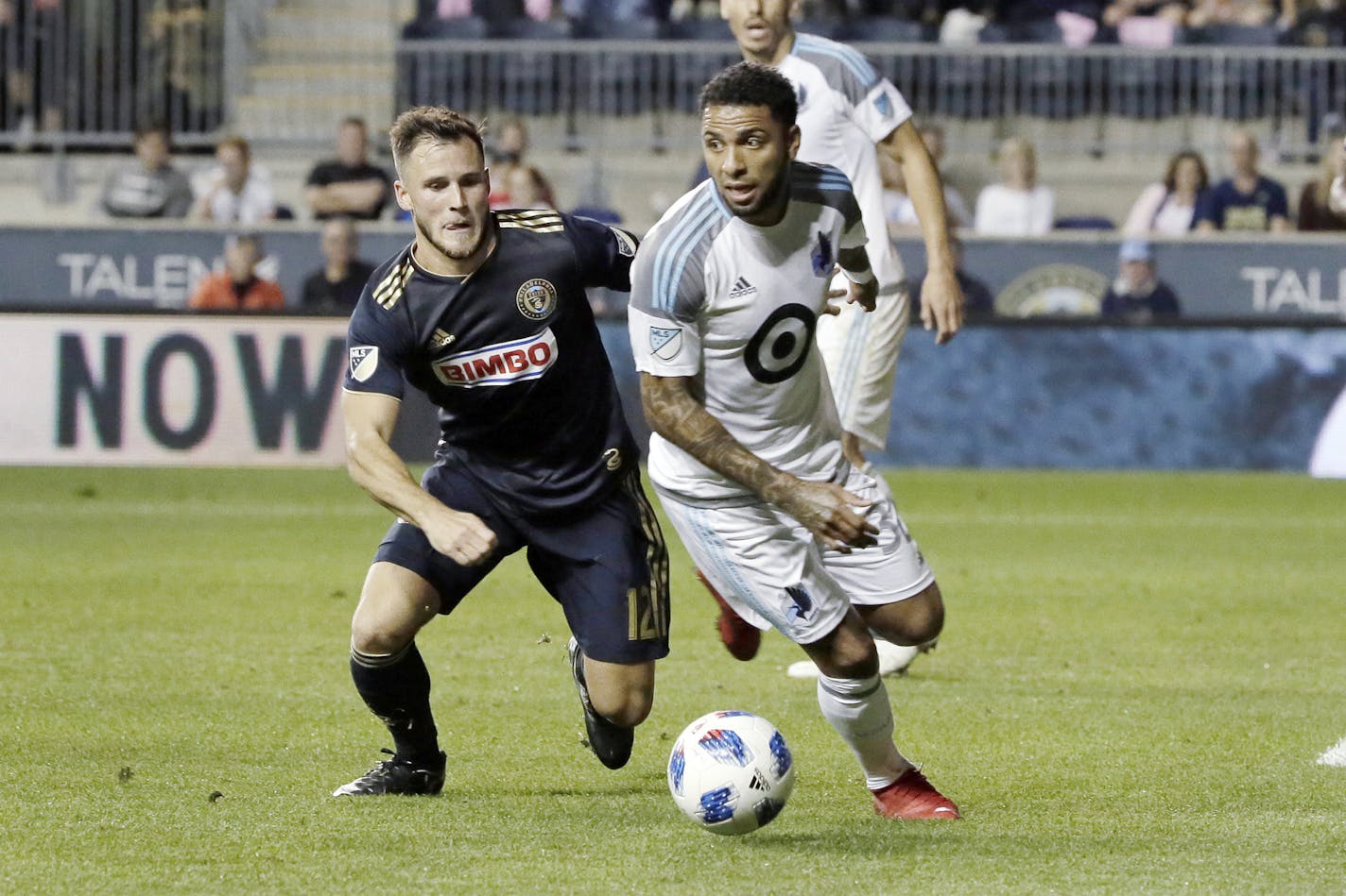 Union&#xed;s # 12 Keegan Rosenberry and United&#xed;s # 32 Alexi Gomez chase the ball in the 2nd half of the Minnesota United at Philadelphia Union MLS match at Talen Energy Stadium in Chester, Pa. on October 6, 2018. MANDATORY CREDIT: ELIZABETH ROBERTSON / Staff Photographer