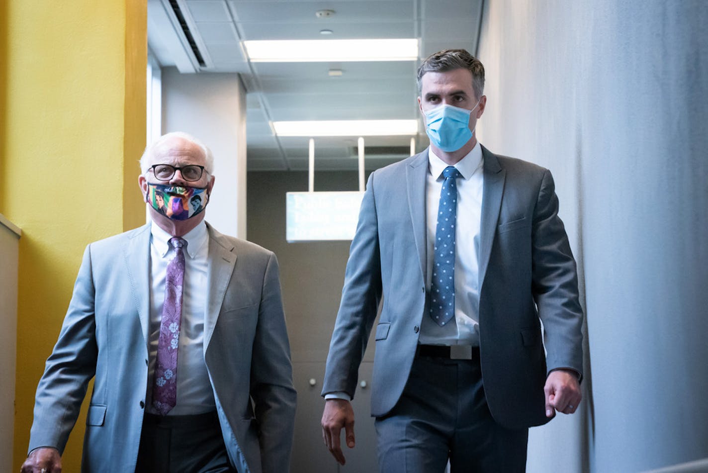 Former Minneapolis police officer Thomas Lane, right, walked out of the Hennepin County Public Safety Facility on June 29 afternoon with his attorney Earl Gray.