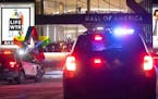 Bloomington Police vehicles are parked outside of the Mall of America after two people were shot and wounded following an altercation Friday, Dec. 31,