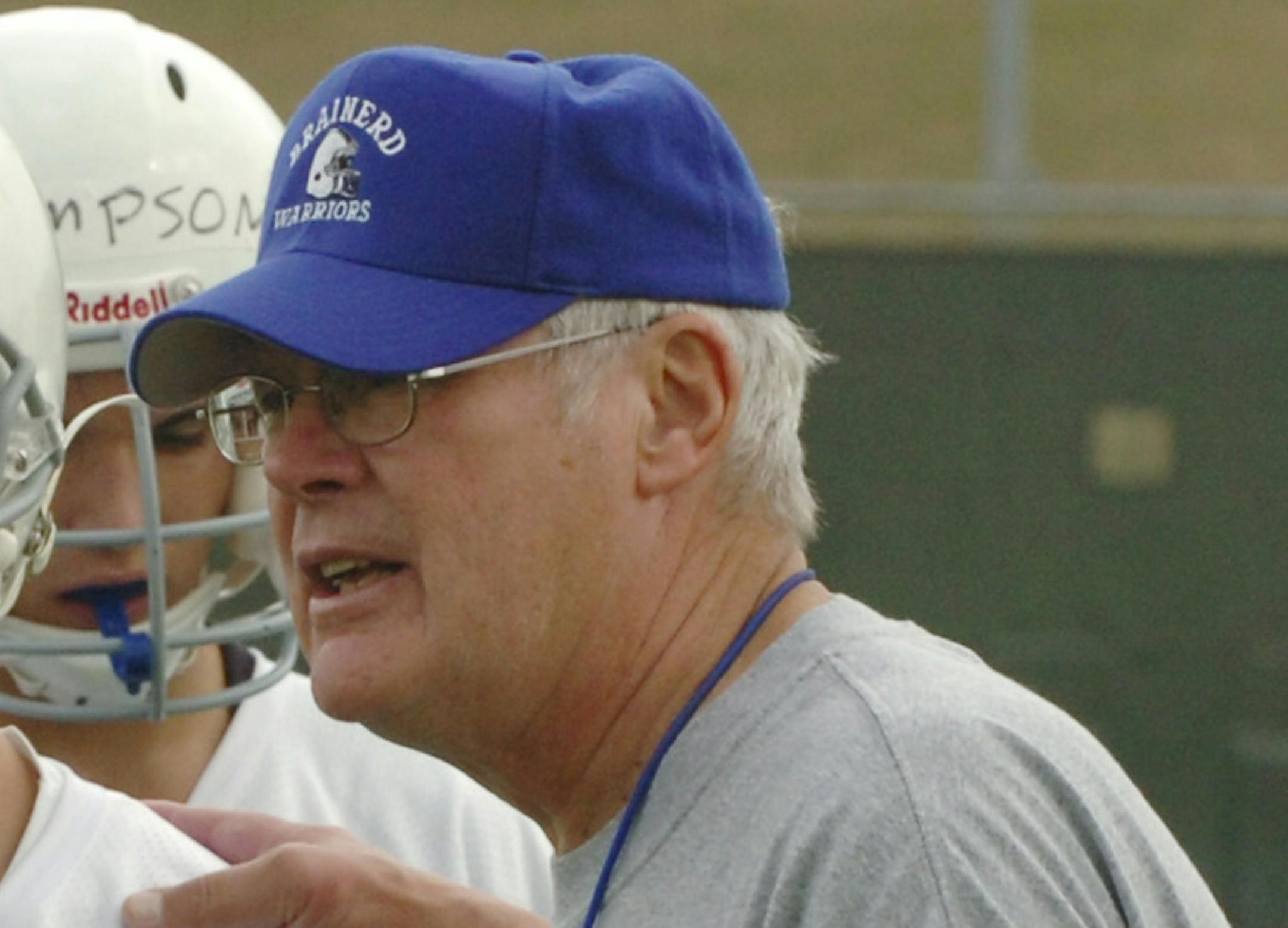 Brainerd Warriors football coach Ron Stolski talked with players on the first day of practice Monday August 13, 2007 at Adamson Field. Brainerd Dispatch/Steve Kohls