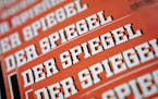 The Dec. 19, 2018 photo shows issues of German news magazine Spiegel arranged on a table in Berlin. An award-winning journalist who worked for Der Spi