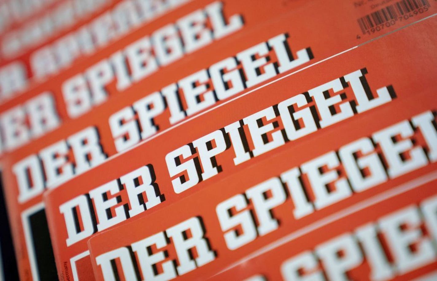 The Dec. 19, 2018 photo shows issues of German news magazine Spiegel arranged on a table in Berlin. An award-winning journalist who worked for Der Spiegel, one of Germany's leading news outlet, has left the publication after being found to have committing what the weekly described Wednesday as journalistic fraud "on a grand scale" over a number of years.