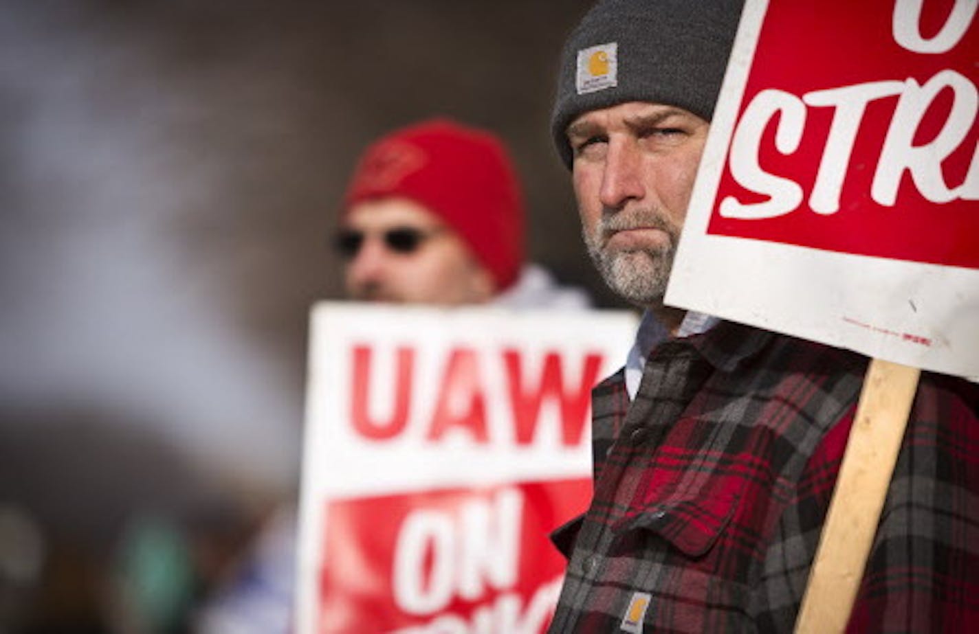 Jeff Radtke, an employee for 28 years at Kohler, on the picket line with other striking workers outside the kitchen and bathroom fixtures manufacturer, in Kohler, Wis., Dec. 8, 2015. A contract agreement and plans for a union-wide vote were announced Wednesday, Dec. 16, 2015, and the strike, which began about a month ago over wages and a two-tiered system that pays new hires far less, may be over. (Ben Brewer/The New York Times)