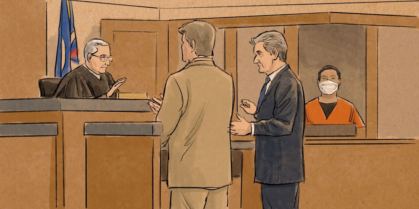 Tou Thao, in custody, makes his court appearance while his attorney Robert Paule, right, and Assistant U.S. Attorney Matthew Frank stand before Judge Peter Cahill. (Cedric Hohnstadt