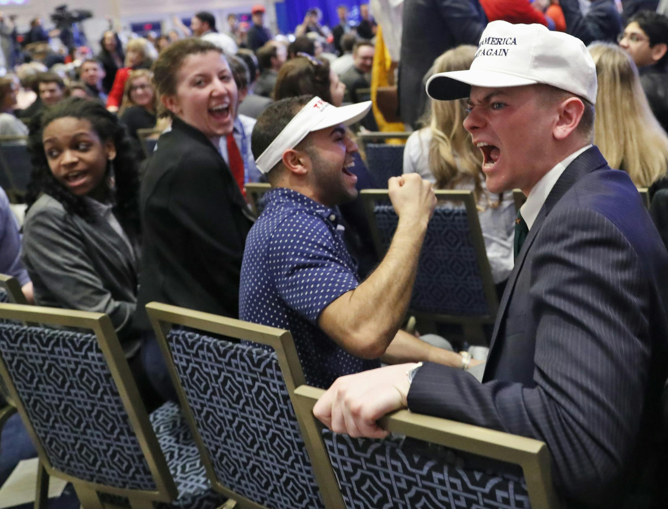 Supporters shout down a protester as President Donald Trump speaks at the Conservative Political Action Conference (CPAC), Friday, Feb. 24, 2017, in Oxon Hill, Md. (AP Photo/Alex Brandon)