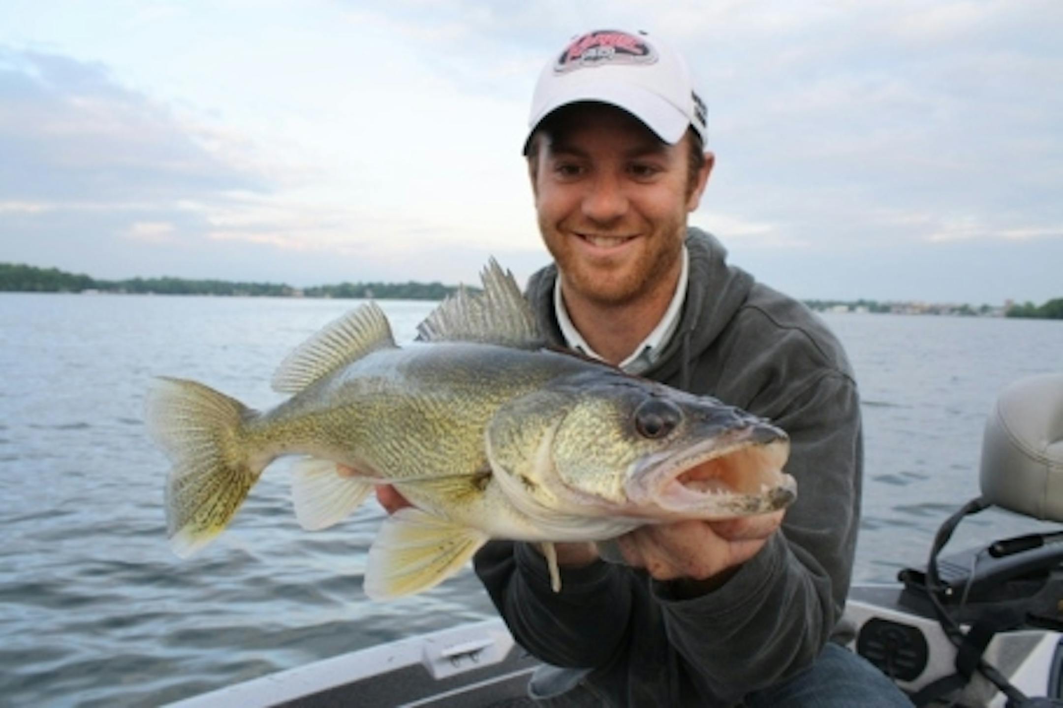 Travis Frank proudly holds a dandy metro walleye from the first week of the 2010 season.
