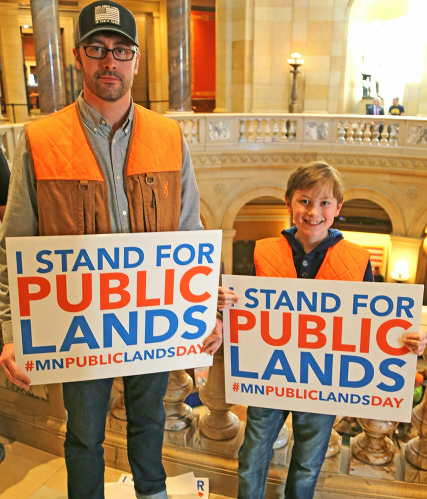 Michael Leighton of Excelsior and his son, Anders, 11, attended the Capitol Rally for Public Lands a year ago in St. Paul. An even larger rally is planned for Thursday. ORG XMIT: MIN1804261350152615