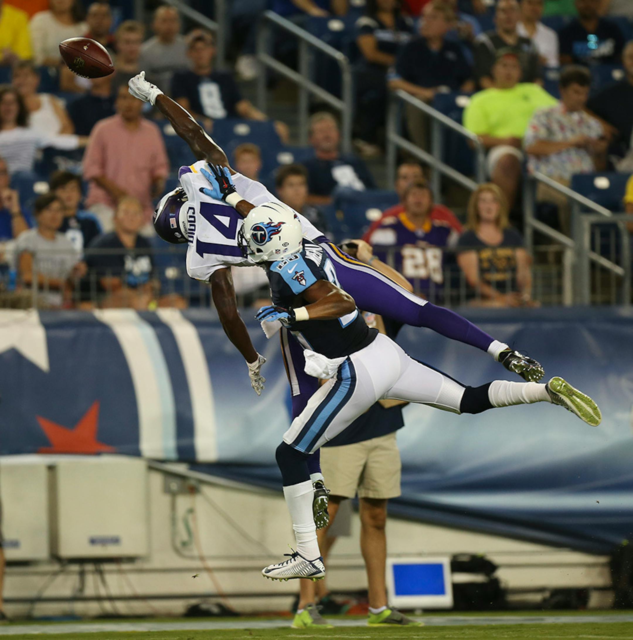 Vikings wide receiver Stefon Diggs (14) was charged for offensive pass interference on this incomplete pass in the first quarter Thursday night. He was covered by Tennessee Titans cornerback Blidi Wreh-Wilson (25).