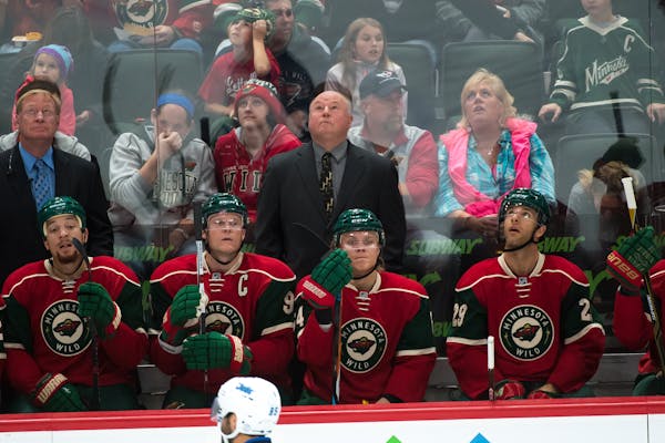 Wild head coach Bruce Boudreau watched the replay after a goal scored by the Winnipeg Jets during the preseason.