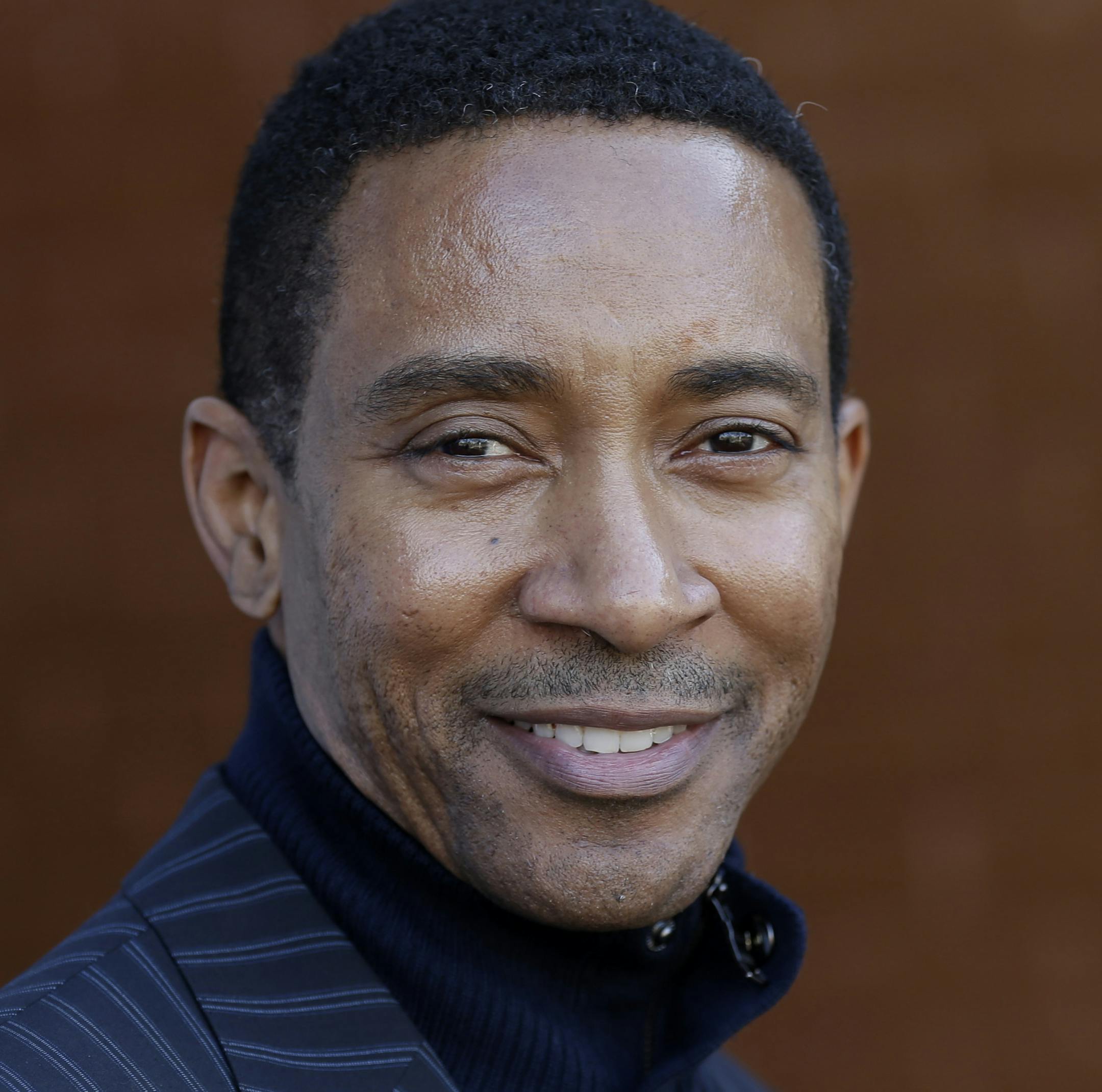 Charles Randolph Wright, director of "Motown: The Musical" poses for a photo outside the Motown Museum in Detroit, Tuesday, Nov. 27, 2012. "Motown: The Musical" begins its run of preview performances March 11 ahead of the official opening on April 14 at New York's Lunt-Fontanne Theatre. (AP Photo/Paul Sancya) ORG XMIT: MIPS103