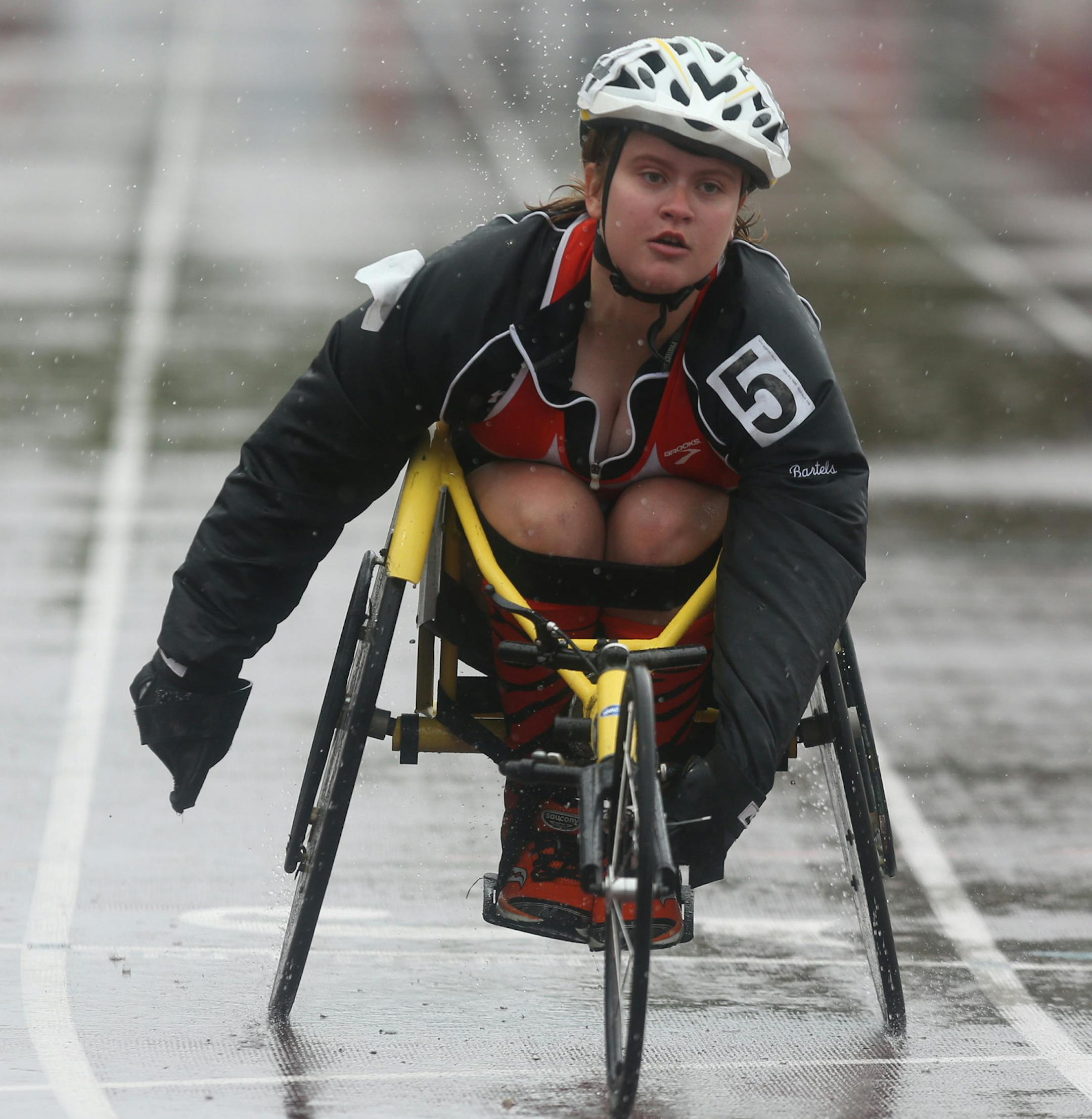 Delano's Marissa Bartels crossed the finish line in first in the wheelchair 100 meter dash. ] (KYNDELL HARKNESS/STAR TRIBUNE) kyndell.harkness@startribune.com During the Class 2A state track and field meet at Hamilne University in St Paul, Min. Saturday, June 7, 2014.